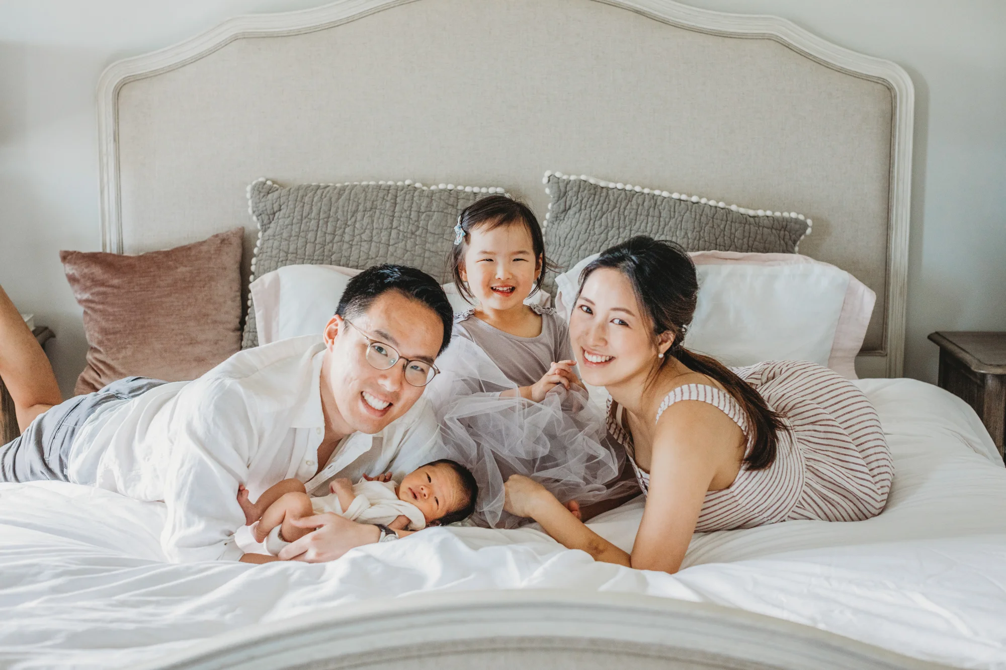Full family portraits during a newborn session in Framingham, Massachusetts. In-home lifestyle photography in Metrowest Boston.