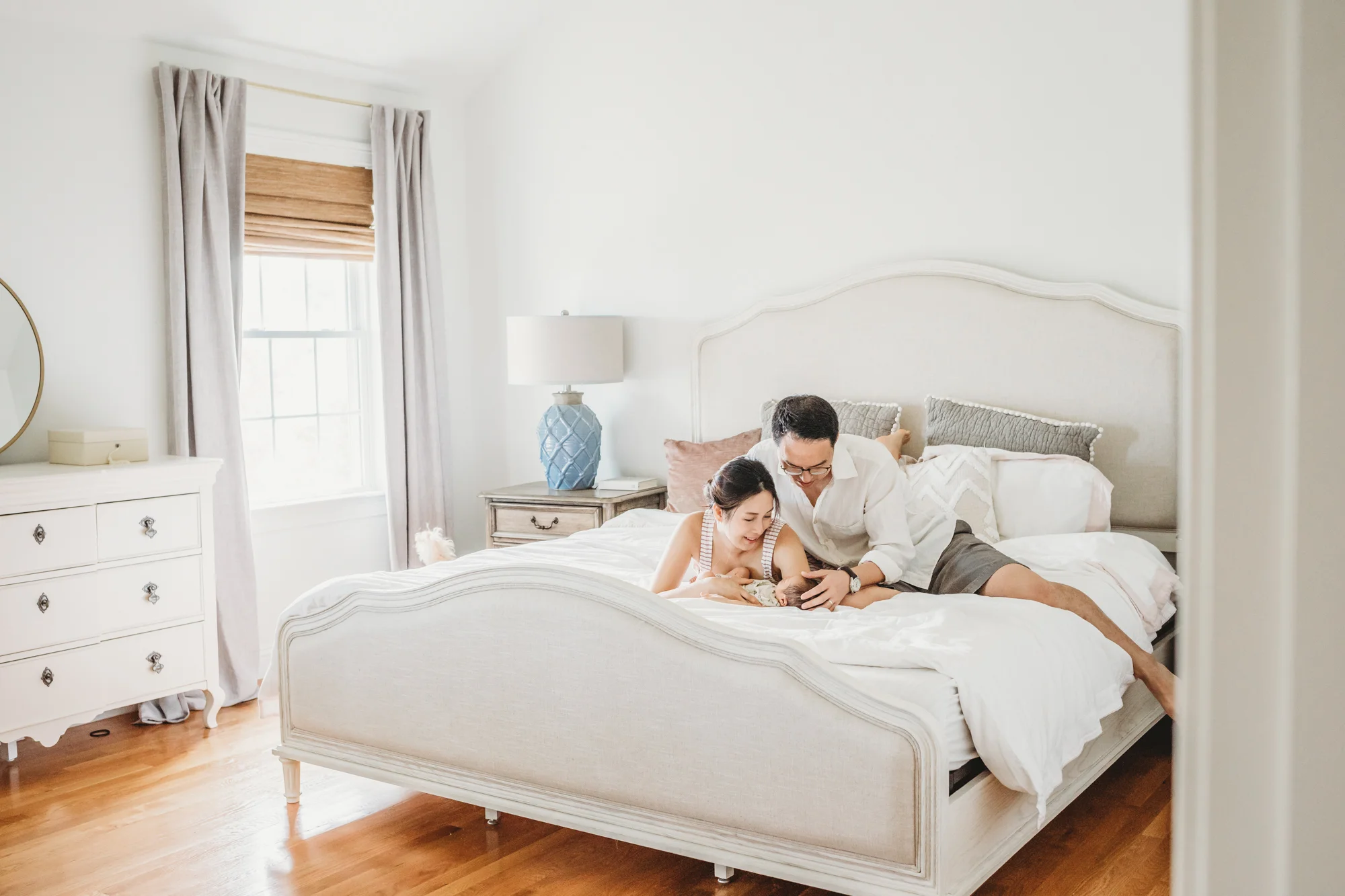 Turning on some calming music creates a serene environment for everyone during a newborn session. Framingham in-home newborn photography. Boston family photographer. Lifestyle photography.