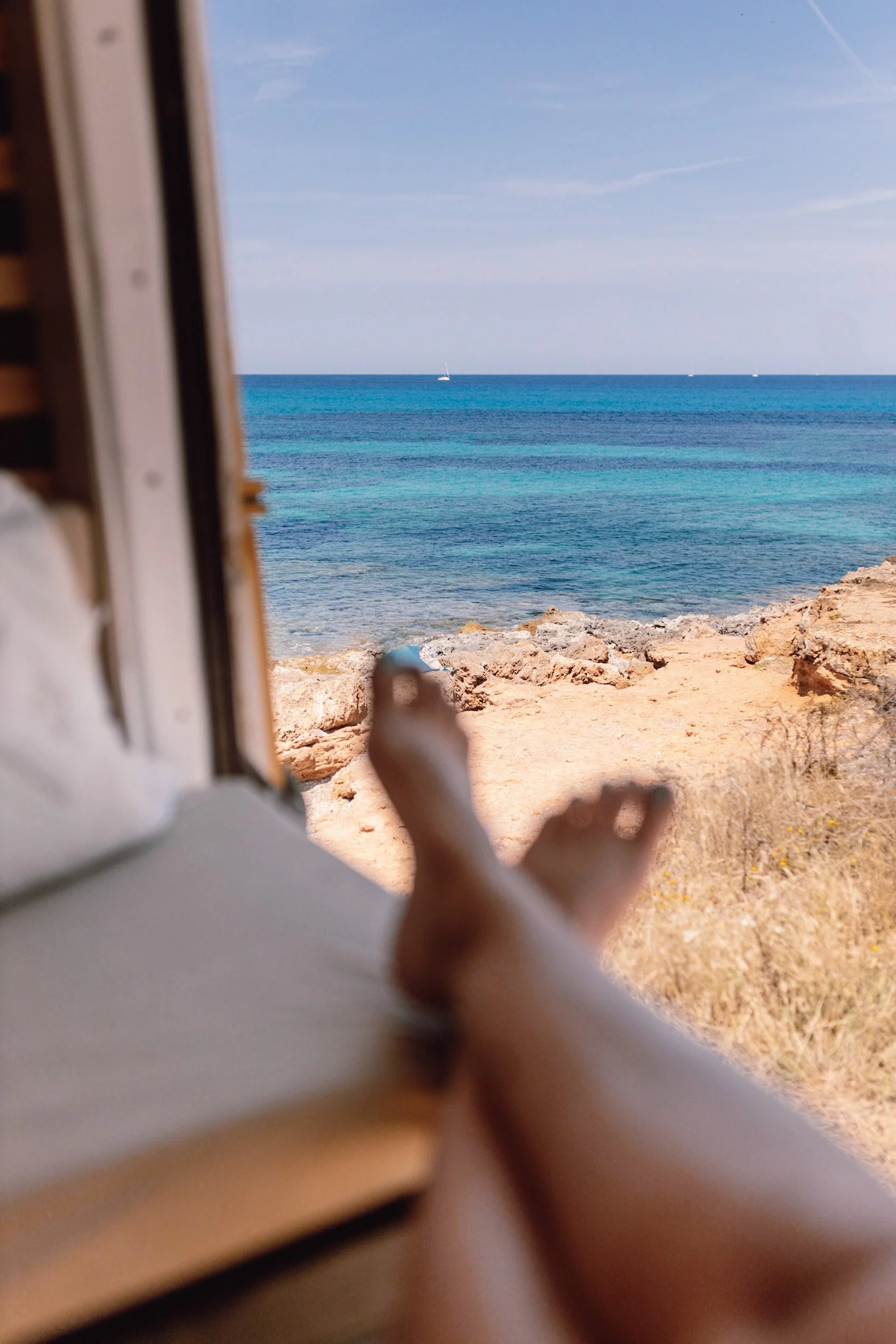 campervan motorhome mallorca road trip intinerary window view of ocean