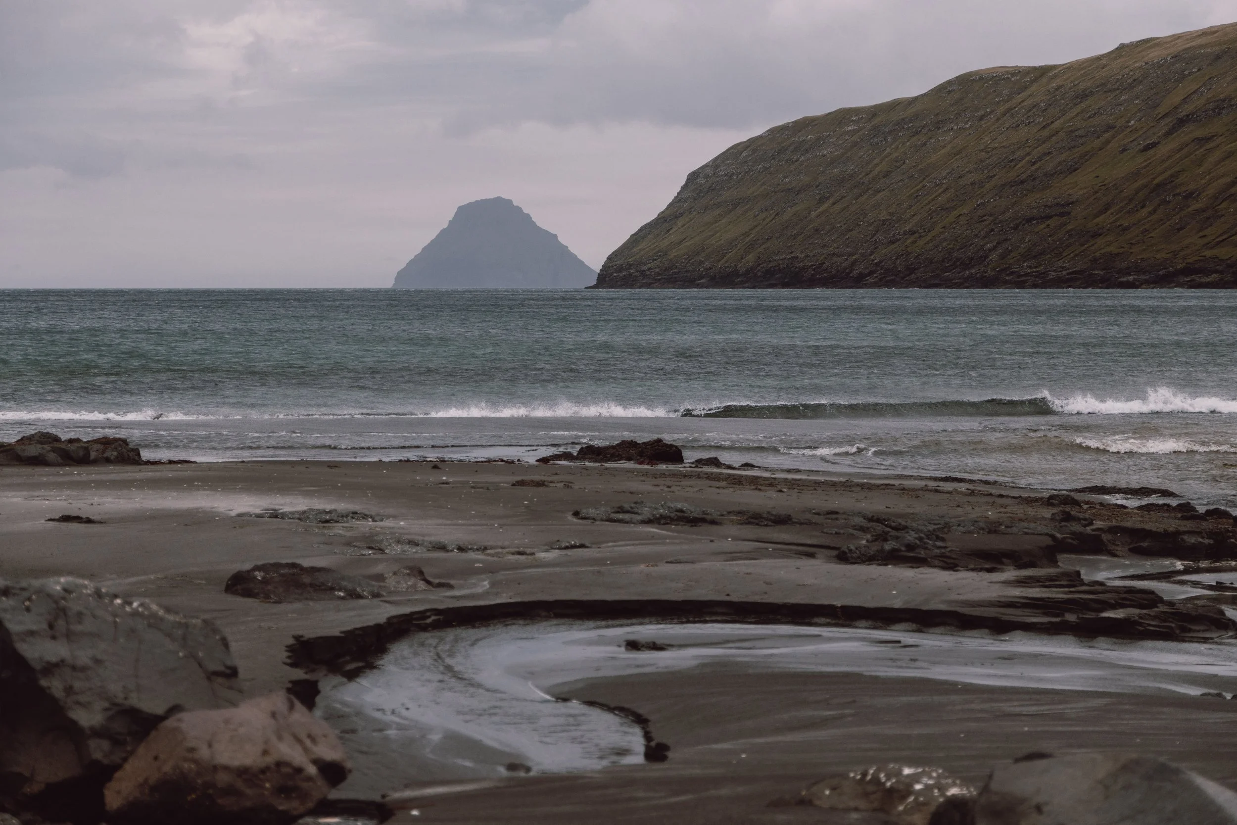 scenic black sand beach at Sandvik in Suduroy