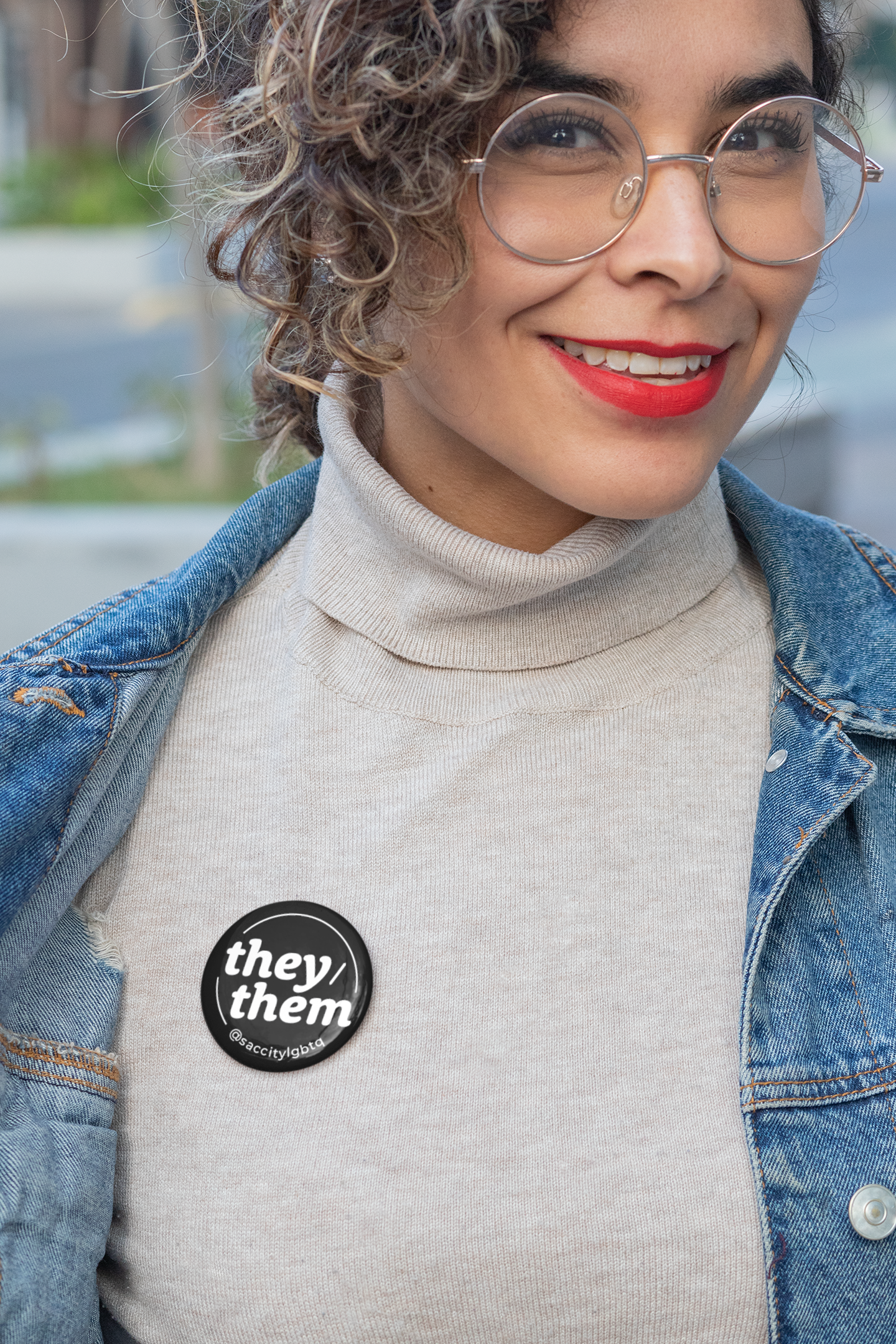 pin-mockup-featuring-a-smiling-woman-with-round-glasses-31898.png