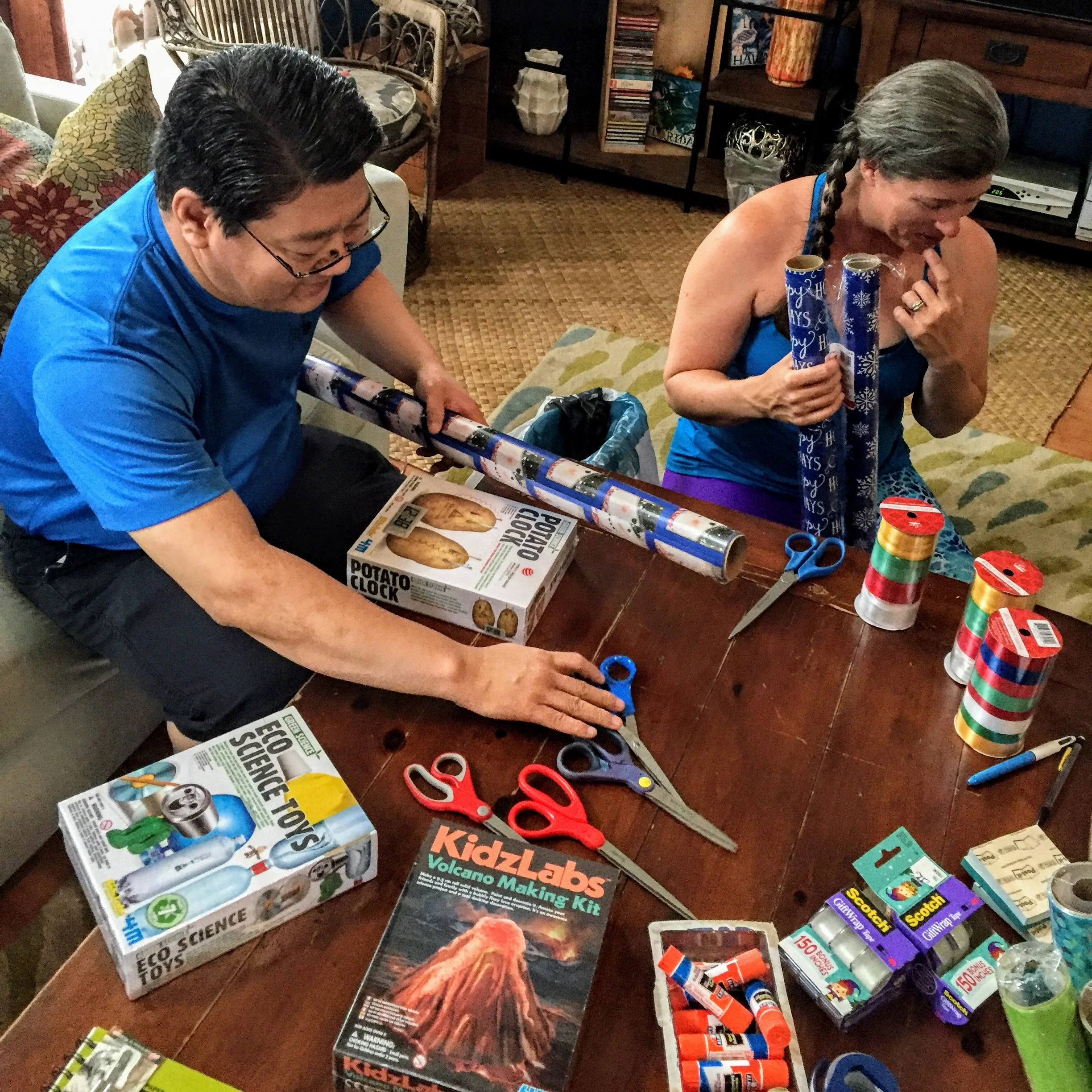 Mitch is about to set a new Guinness World Record for wrapping presents quickly. Sarah is planning her next move. 
