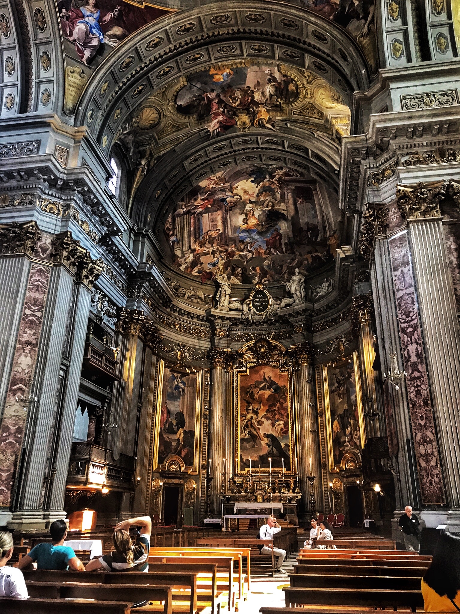 The inside of stone churches in Rome are very cool even on a hot day. Karol and Keane have never before been so religious. 