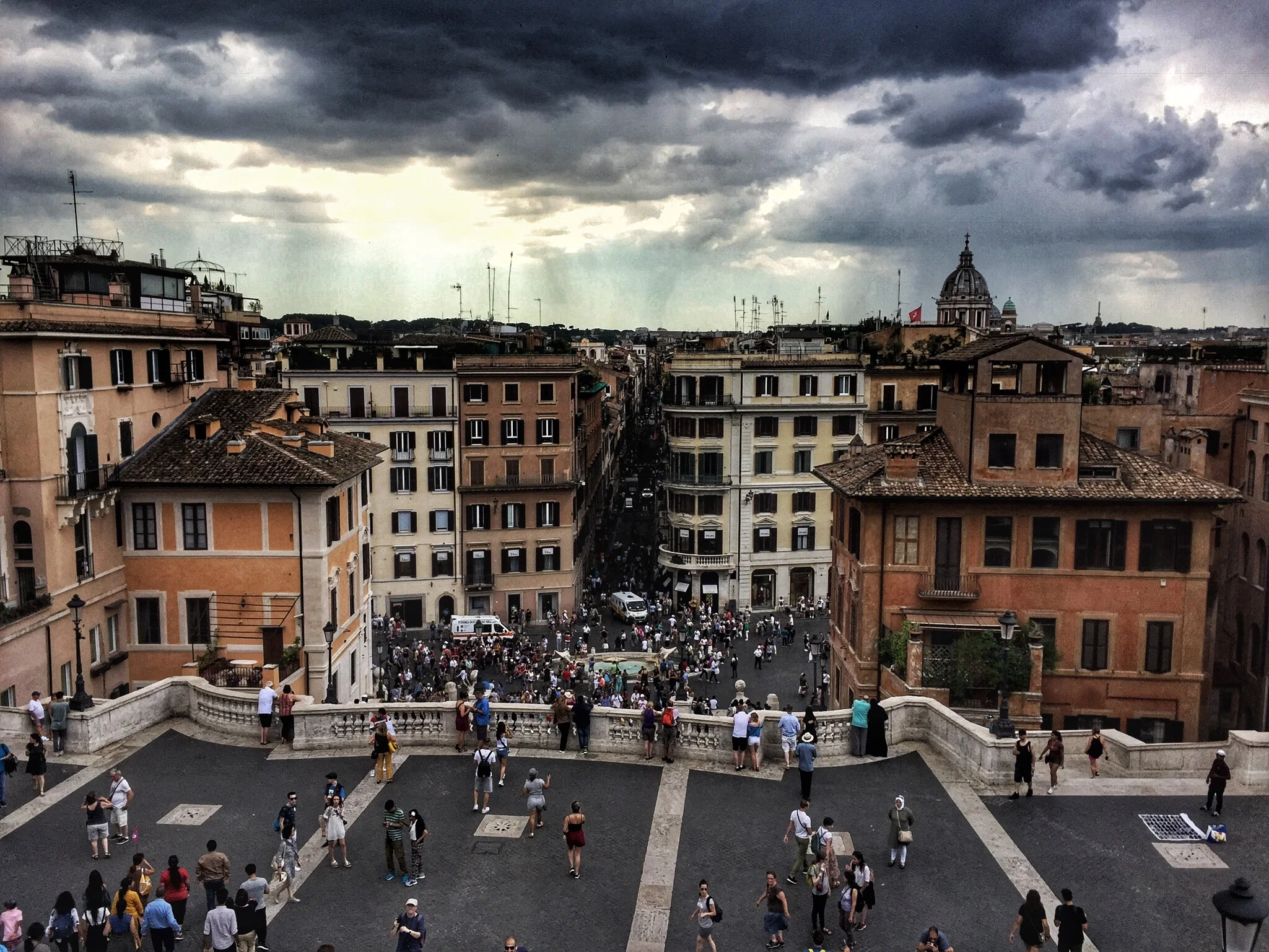 A storm brewing over Rome. You can spot the dome of St. Peter's Basilica on the right.