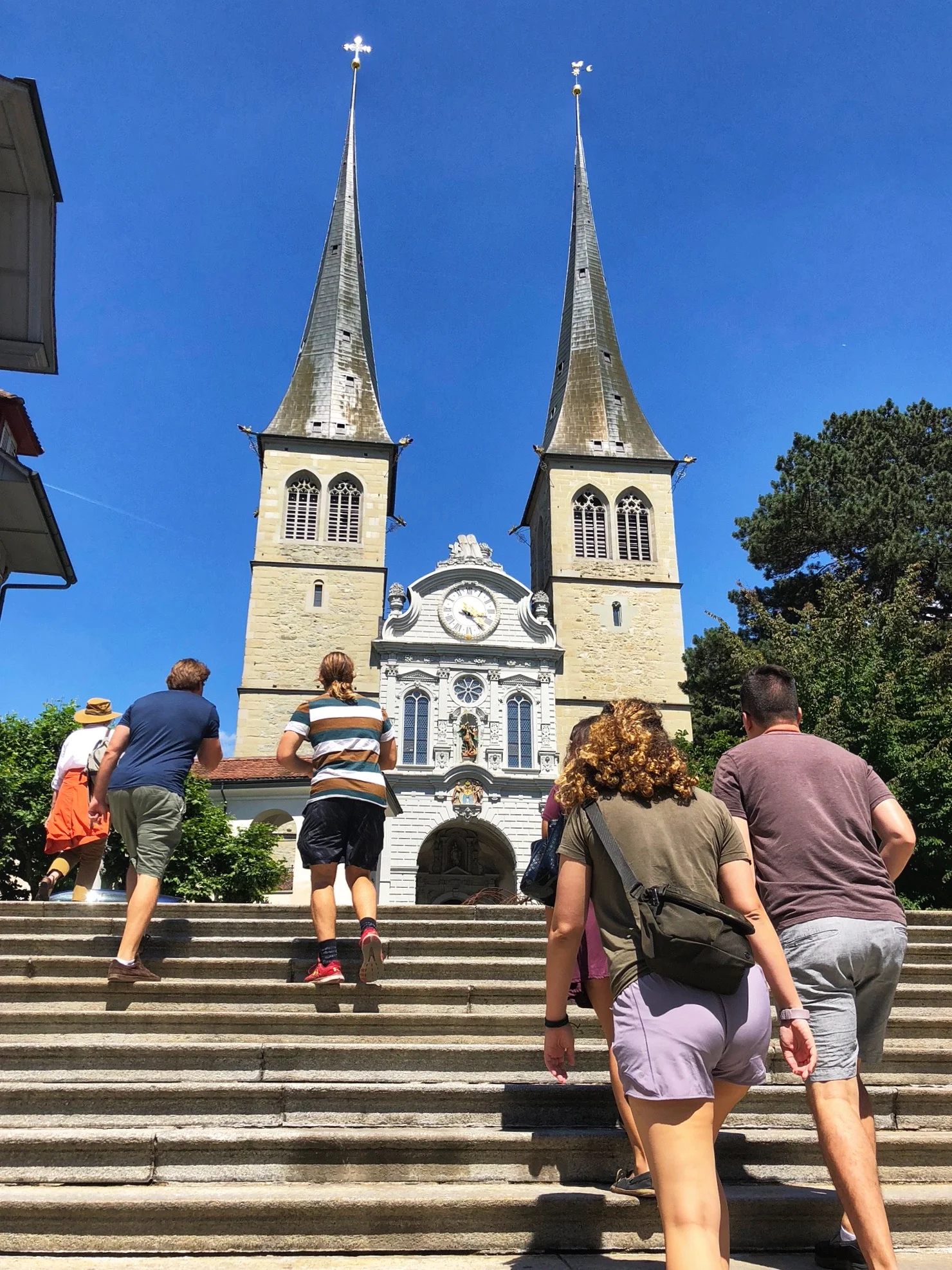 Walking up the steps to the Hofkirche in Lucerne. 