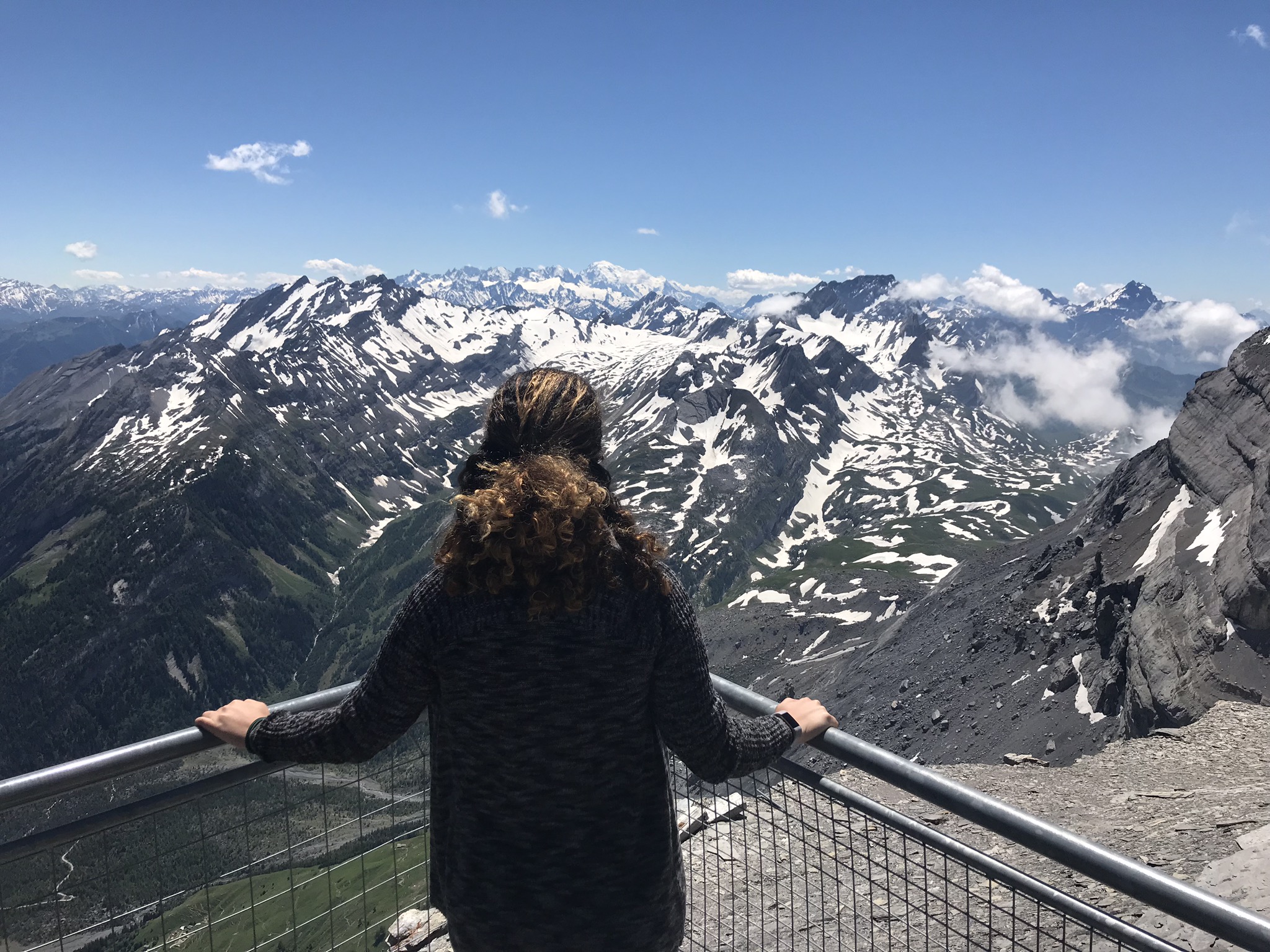 Lena is taking in the view from a little mountain top restaurant. 