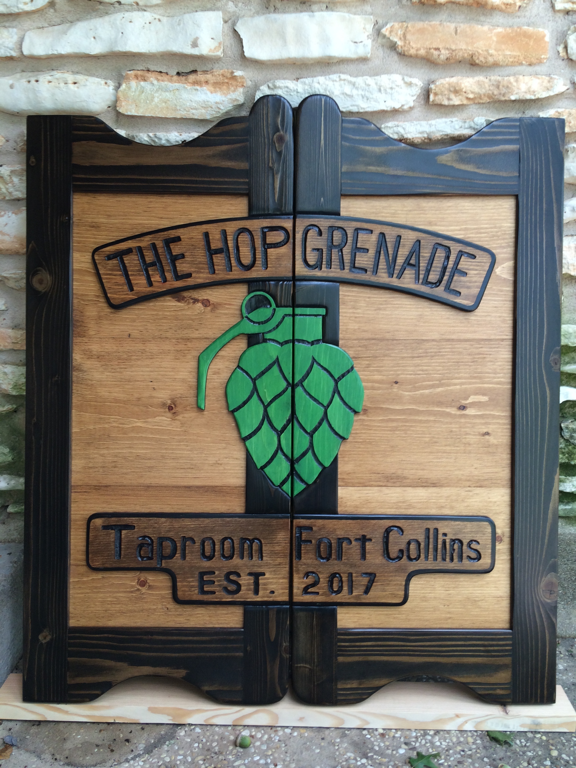 The Hop Grenade western saloon door with company logo