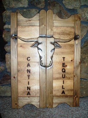 Cantina Tequila tall western saloon doors with Texas longhorns
