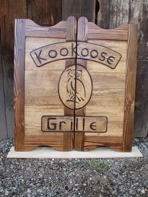 KooKoose Grille western saloon door with logo