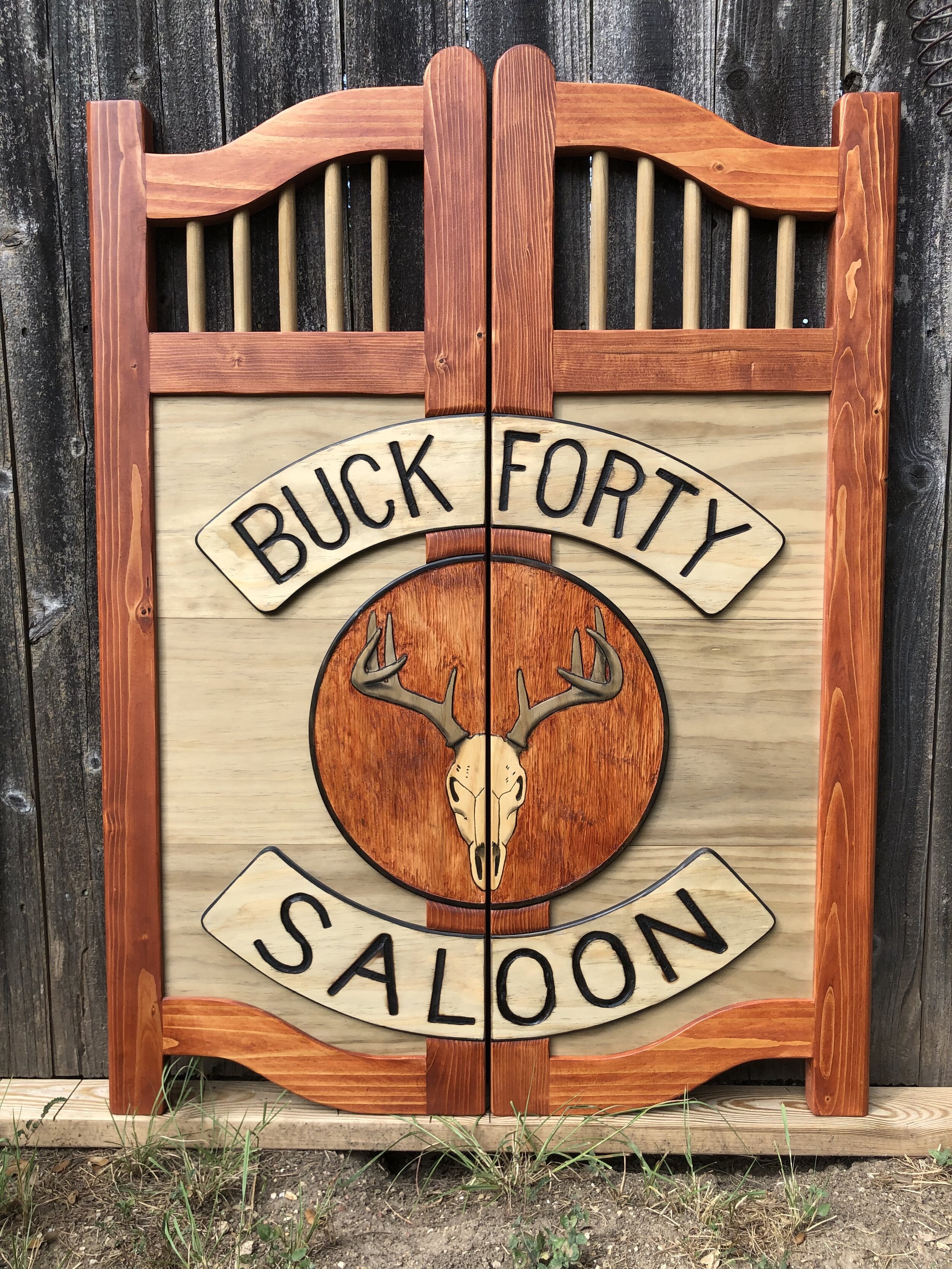 Saloon Door with Deer Skull and Red Stain