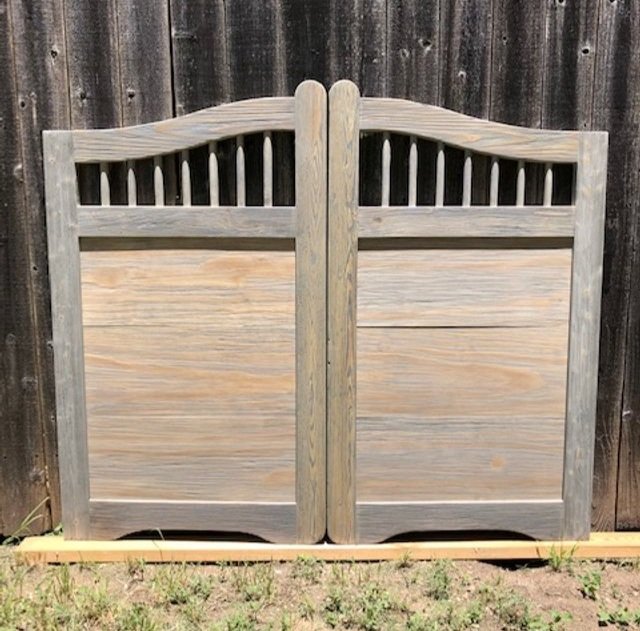 Western+saloon+doors+with+spindles+and+natural+stain.jpg