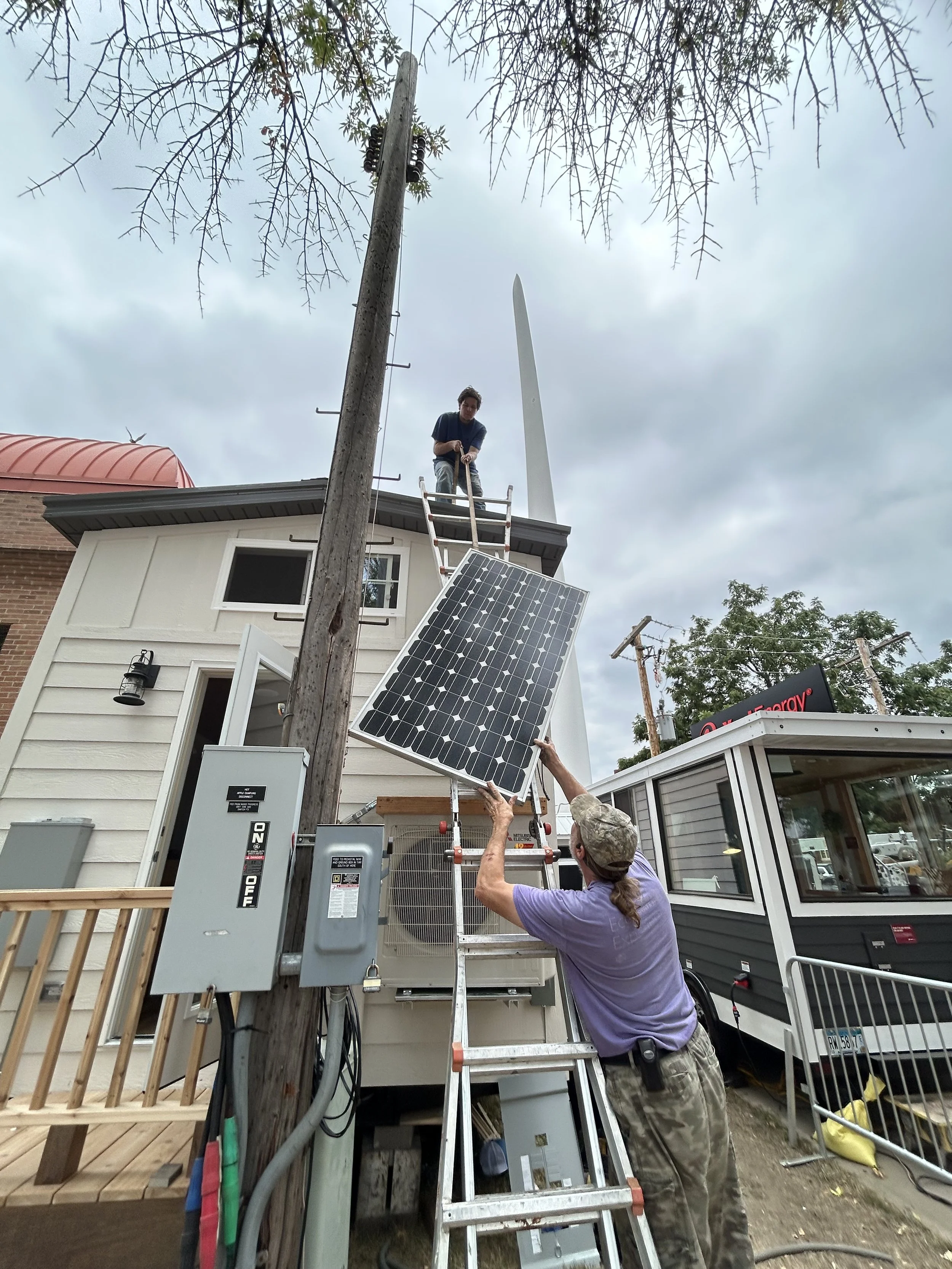 Jerry & son mounting solar_IMG_7400.jpeg