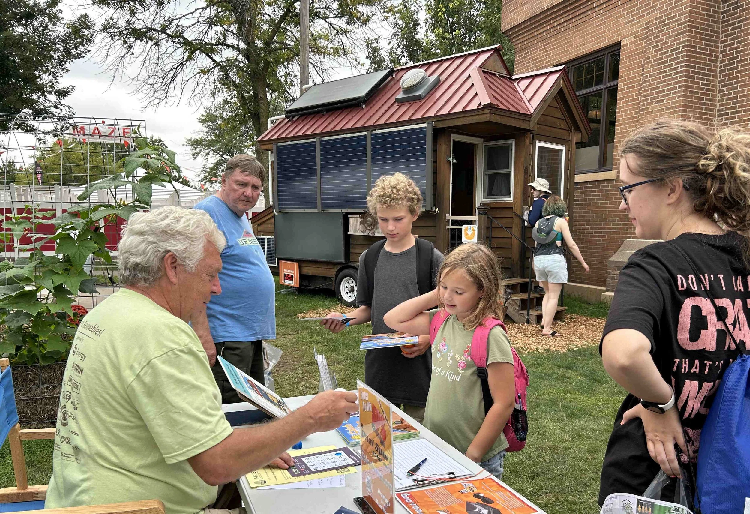 Steve w Tiny House bingo family_IMG_2929.jpg