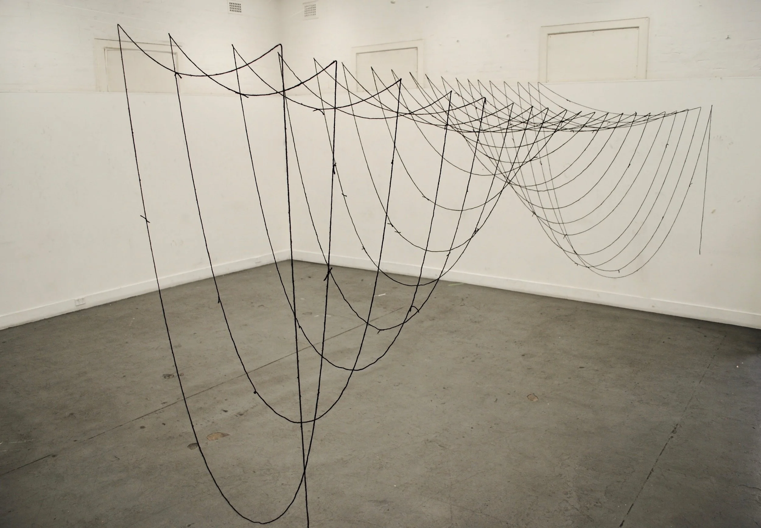   Bumpy Ride  2017, 230cm H, wool and nylon string 