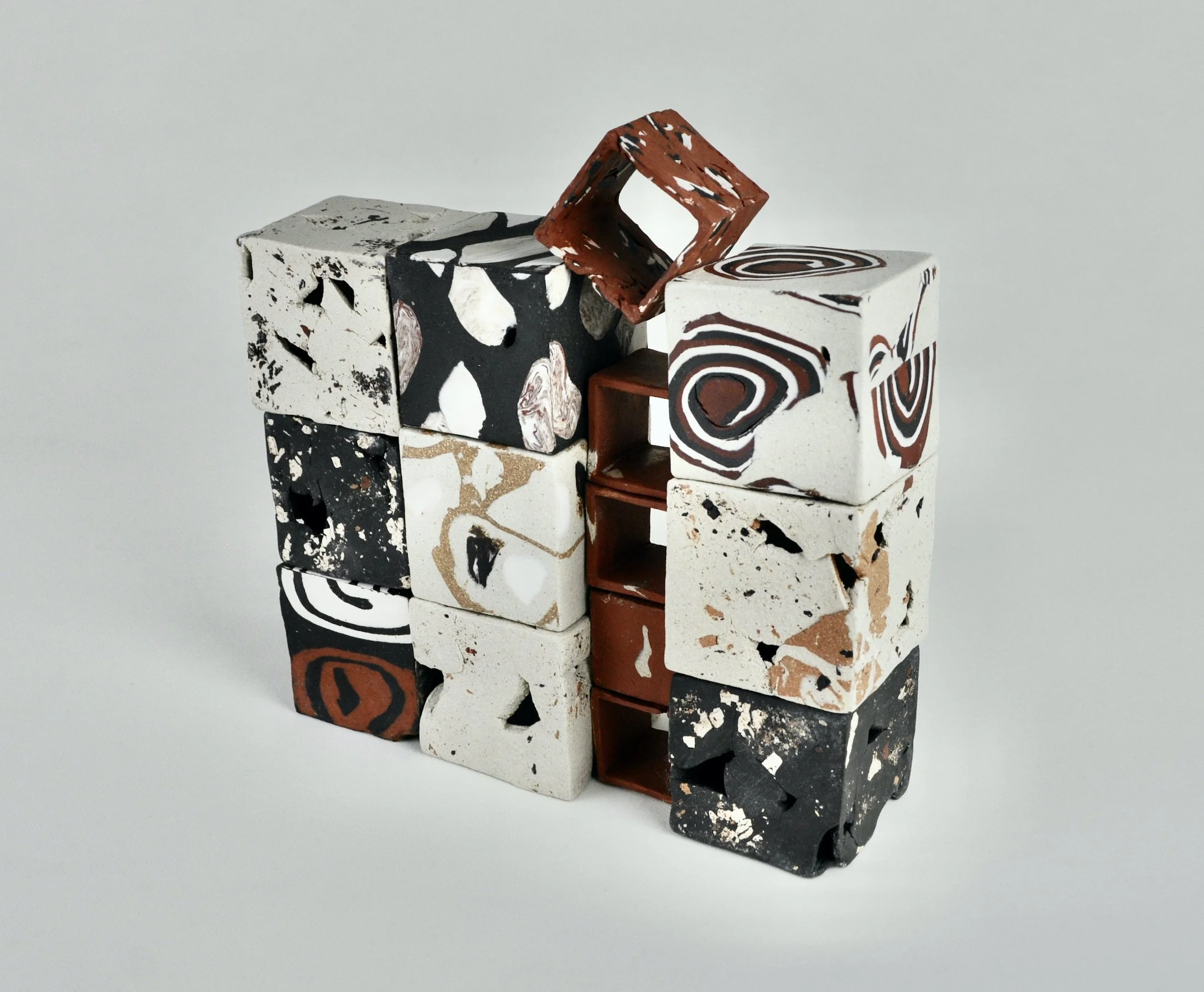   Holding Memories  2022, 23cm H x 23cm W x 6.5cm D,  assorted clays, unglazed 