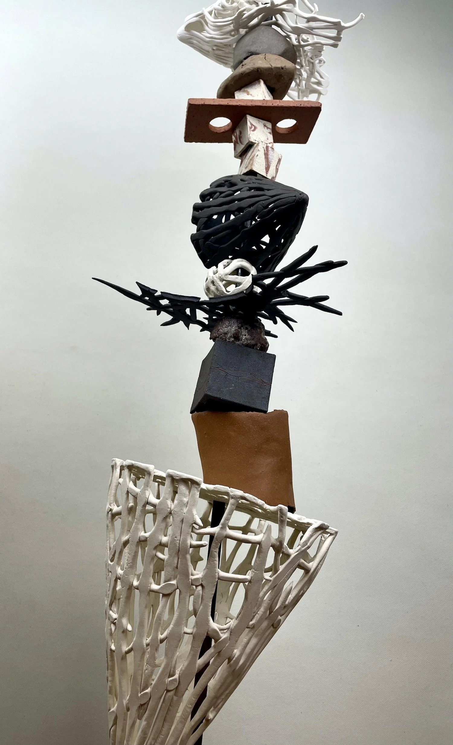  After the Storm  2025, detail of totem 90cm H, porcelain, dark matter and found clay 