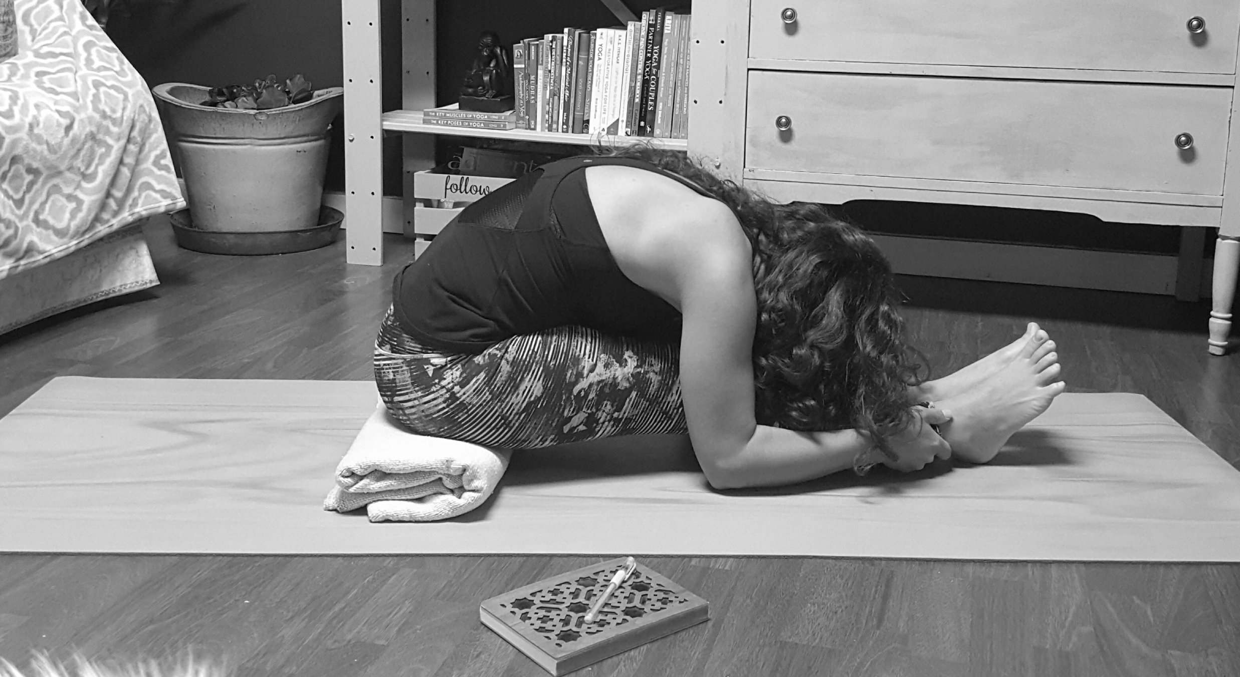 Paschimottanasana, modified with a blanket