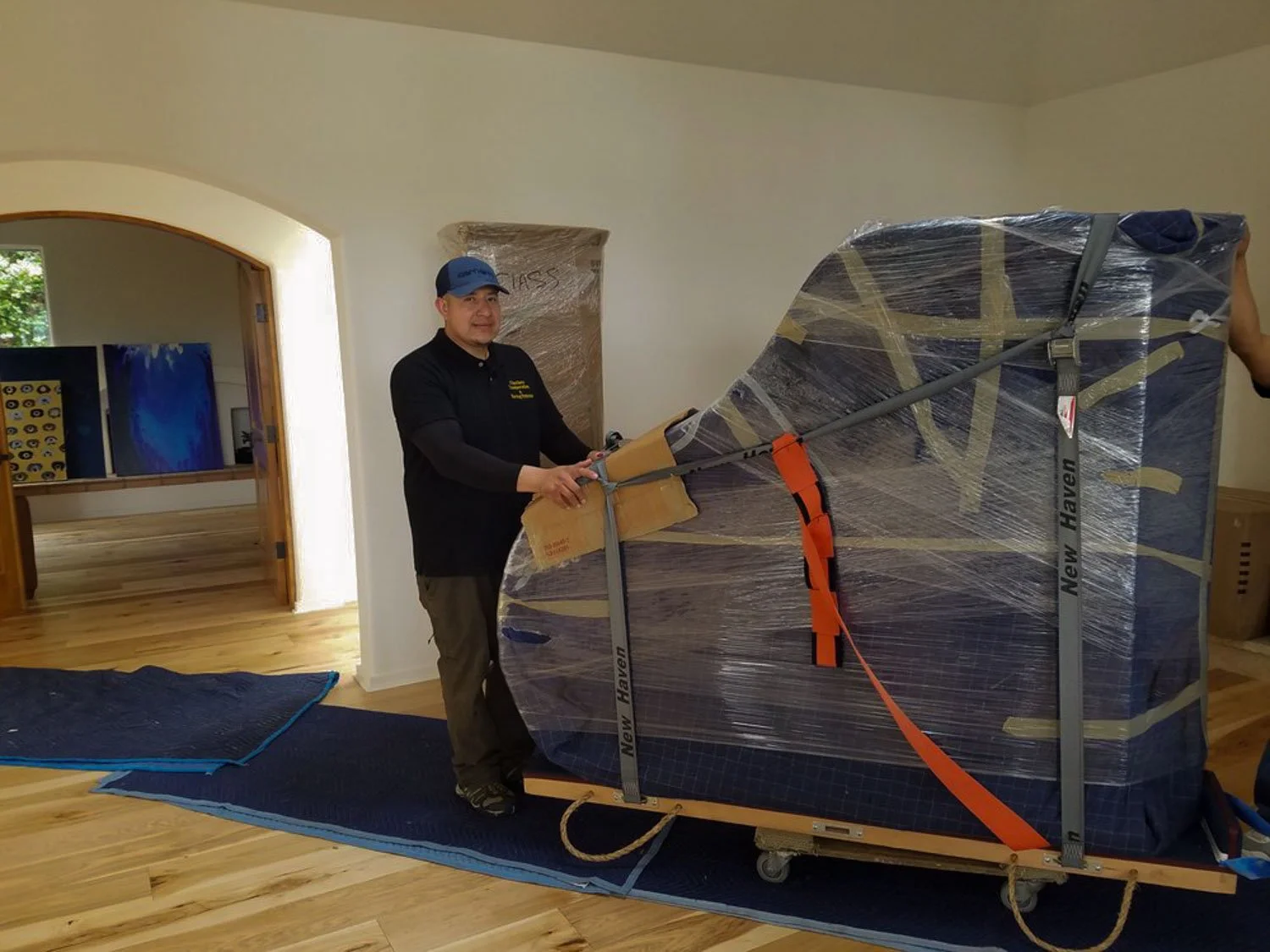 Mover transporting a piano locally in Monterey Bay