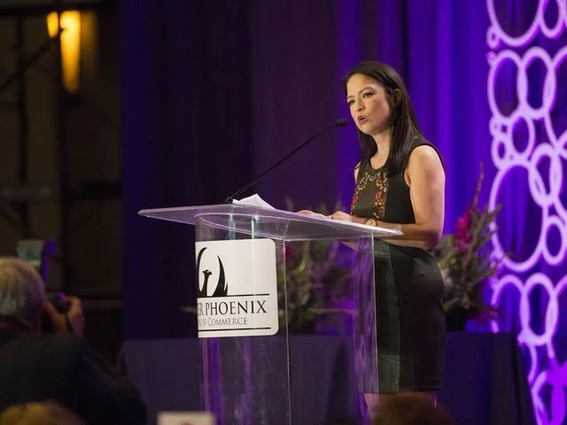 MAP Strategies Group CEO Mi-Ai Parrish accepts the 2017 ATHENA Award as Businesswoman of the Year (private sector).