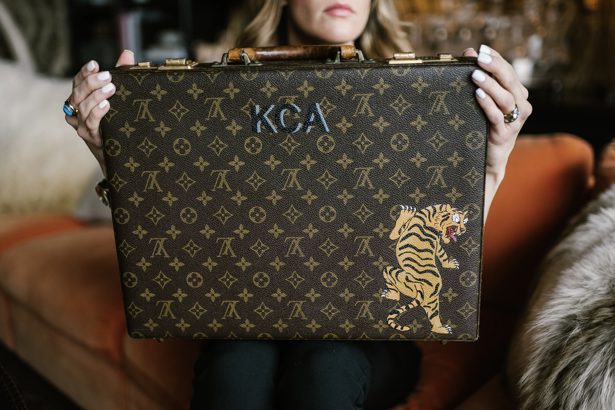 The new monogram: Designer bags customized by Texas artists are swinging up