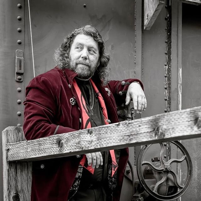 David Velock: lover of Ren Faires and Folk Music, believer in Faith and Goodness, Honest, Loyal, Available... and Bass Player of One Sultry Day.