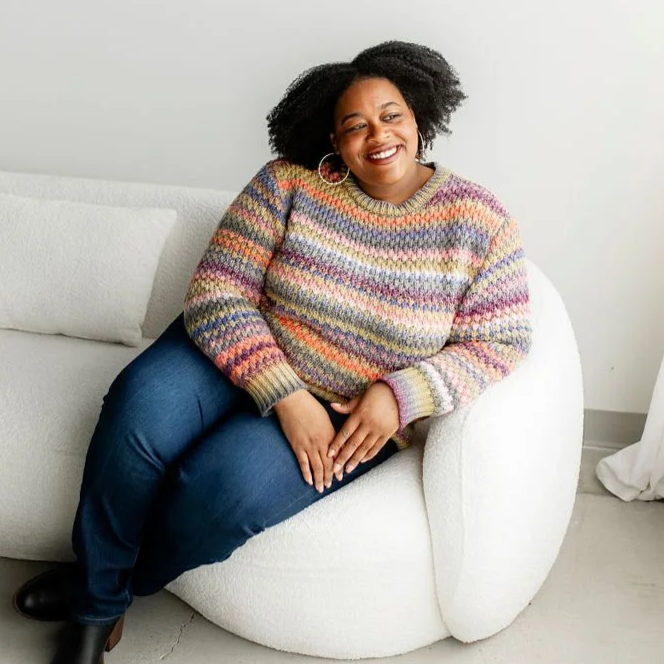 Sashay Lurry, sitting in a therapy chair offering therapy for children and young adults in Ferndale, MI 48220