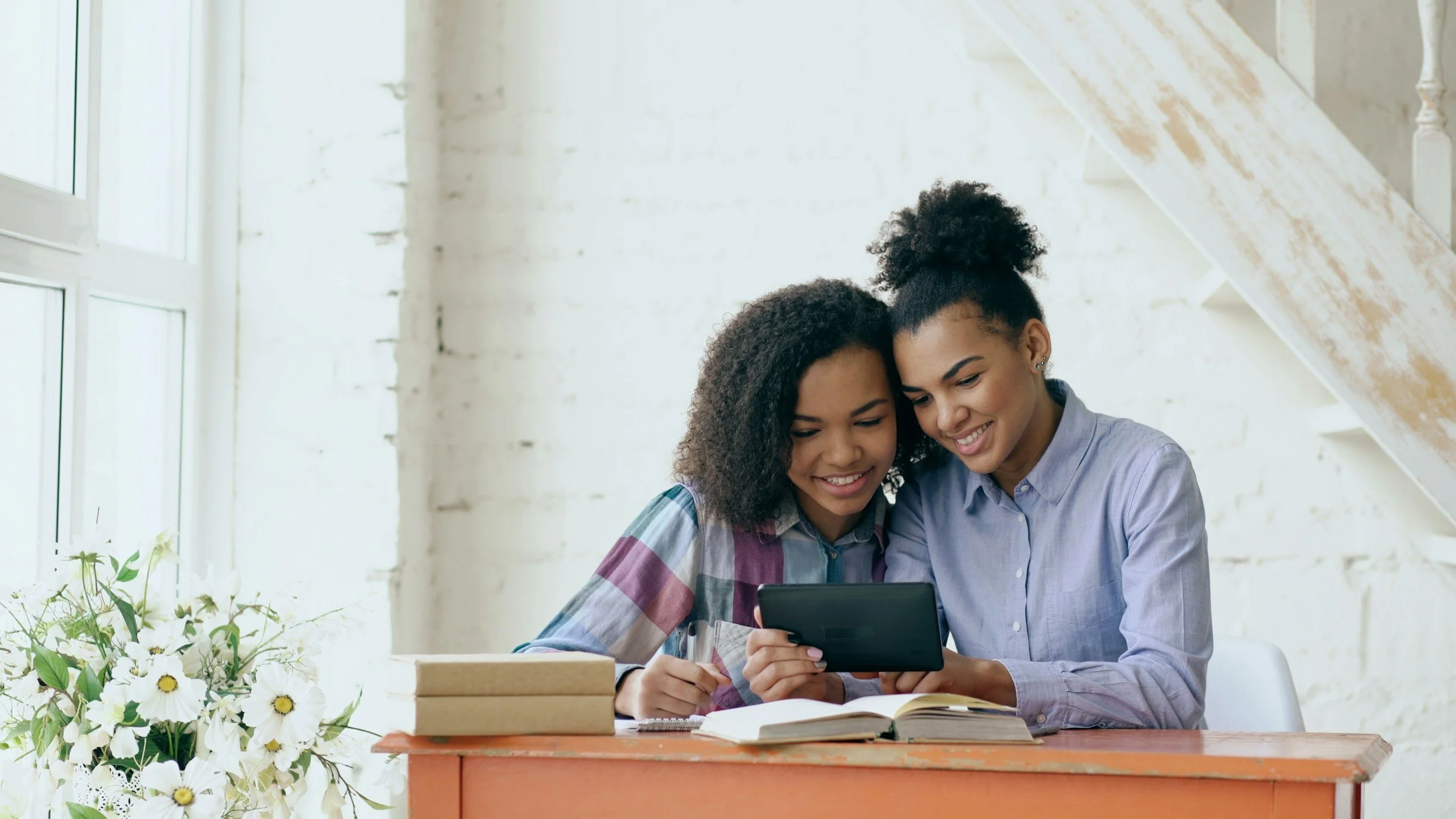 a mother and daughter reading together after school as a moment of connection and routine building
