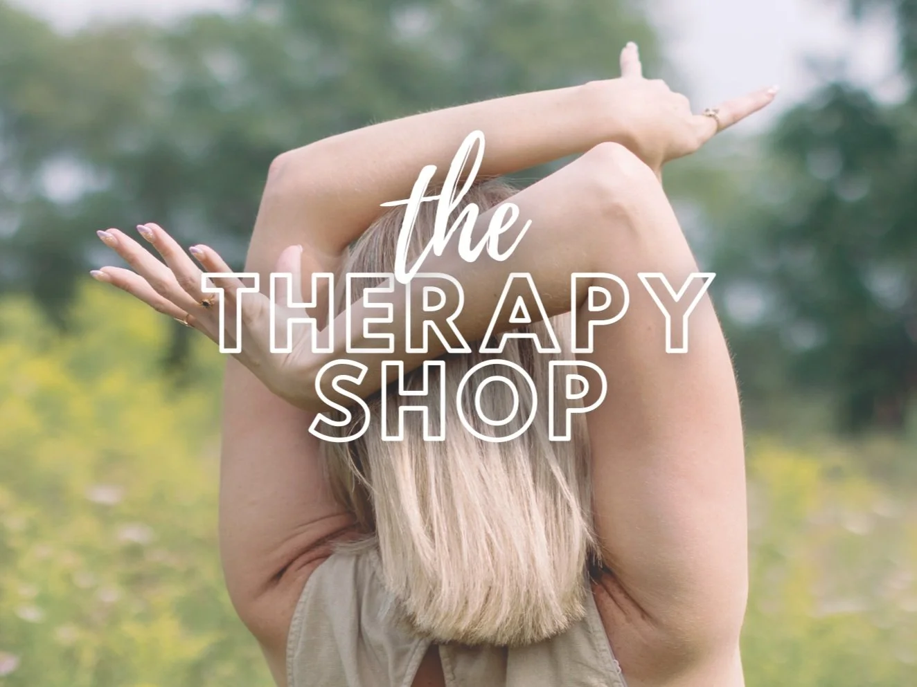 woman dancing in a field. therapeutic tools, resources, and merchandise in Michigan