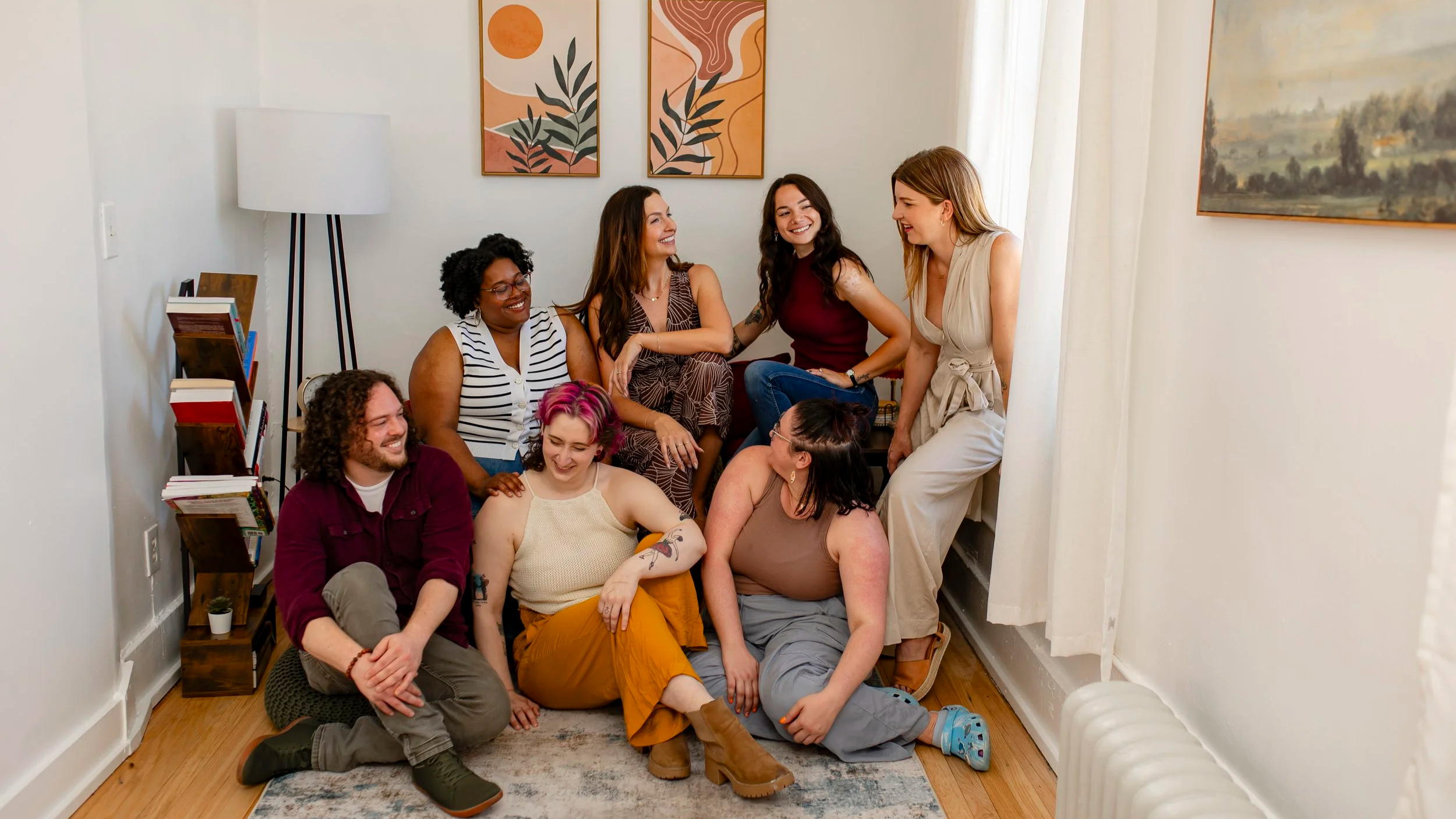 The staff at Inspired Healing Therapy gather in the new space at their Ferndale location for a team meeting, each therapist brings a unique approach and perspective on caring for their clients