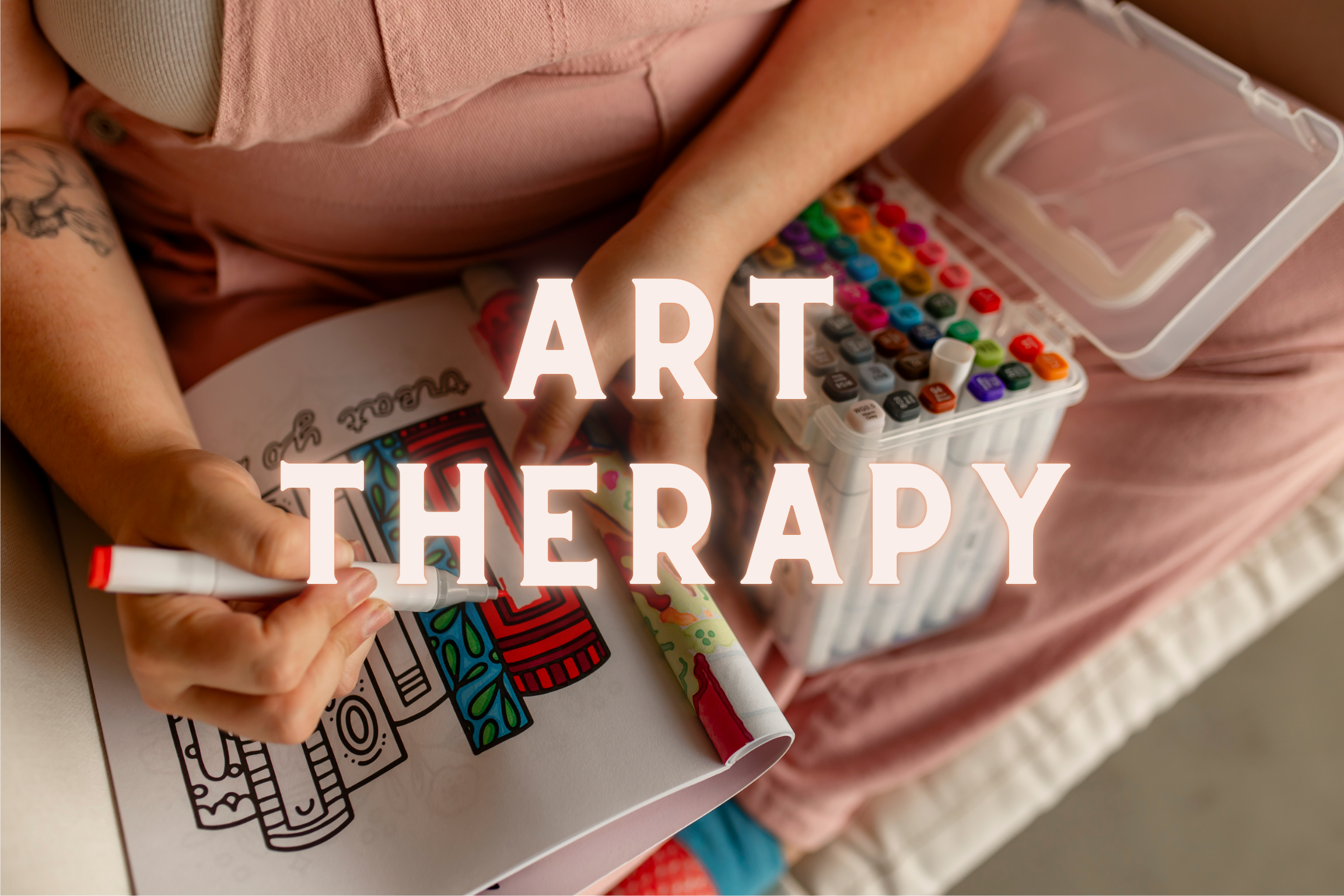art therapist, Jessi, utilizing an adult coloring book for grounding and mindfulness during a session