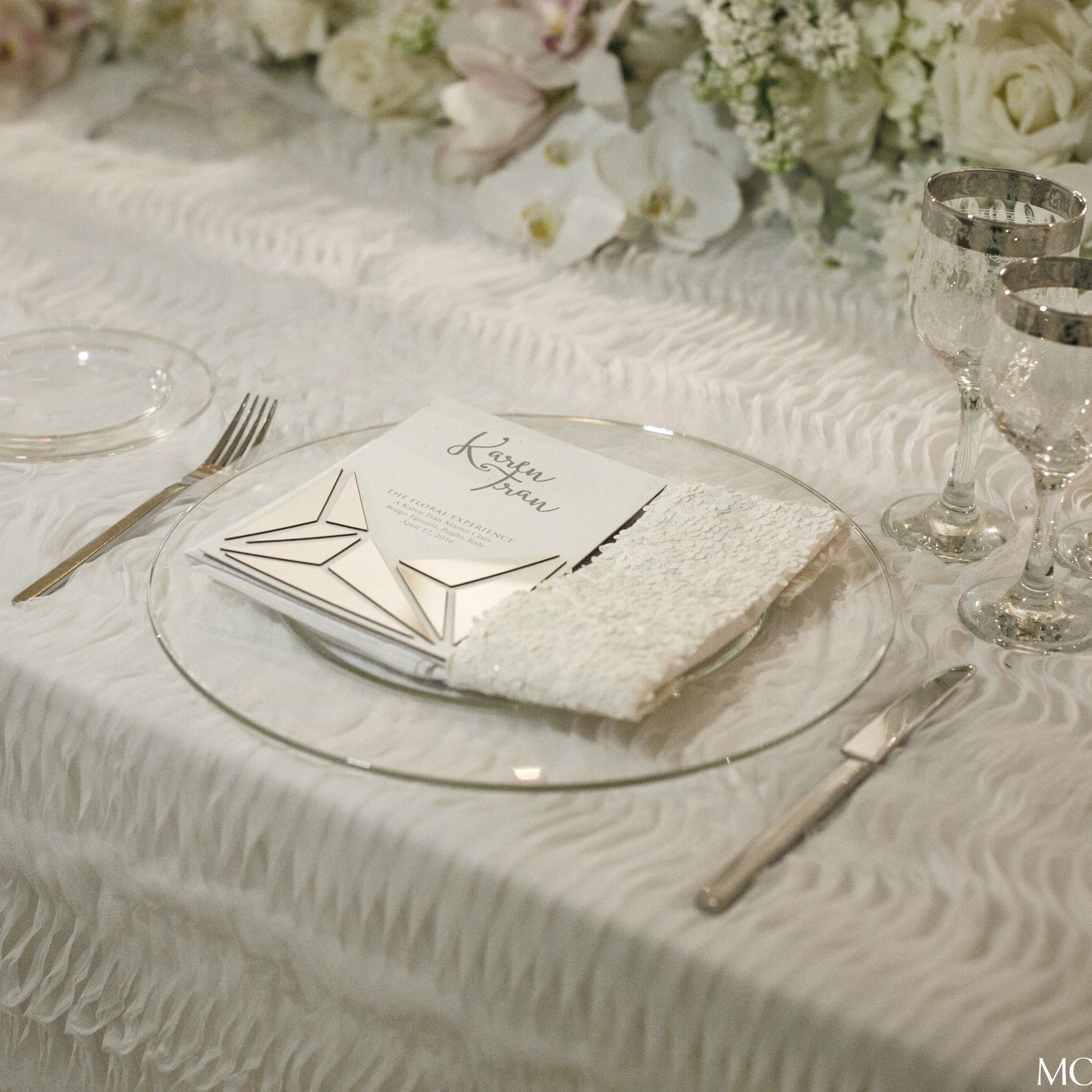 white_tulle_wave_linen_rental.jpg