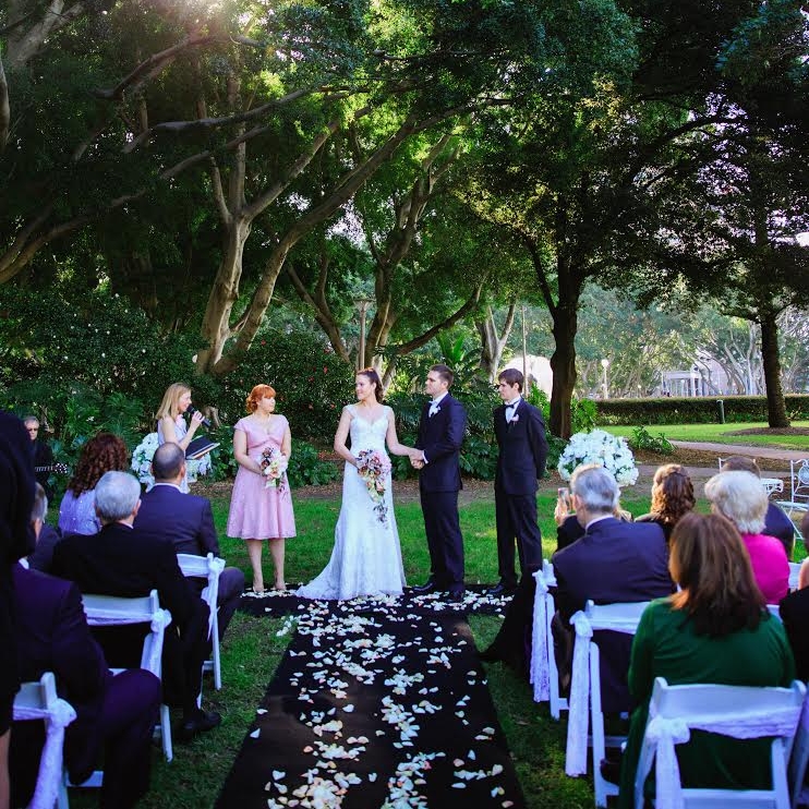 Black_carpet_with_ fresh_rose_petals_aisle_outddor_weddings.jpg