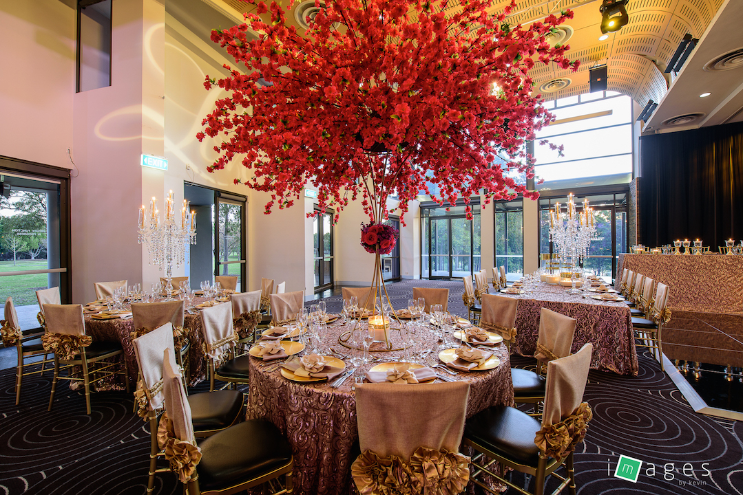 Waterview - Lake Room - PB Champagne Paisley tablecloths, Sofia gold chair caps, Gold KT stand with Silk Cherry blossom on top and fresh flowers on collar and gold accessories guest tables - Image 1.jpg