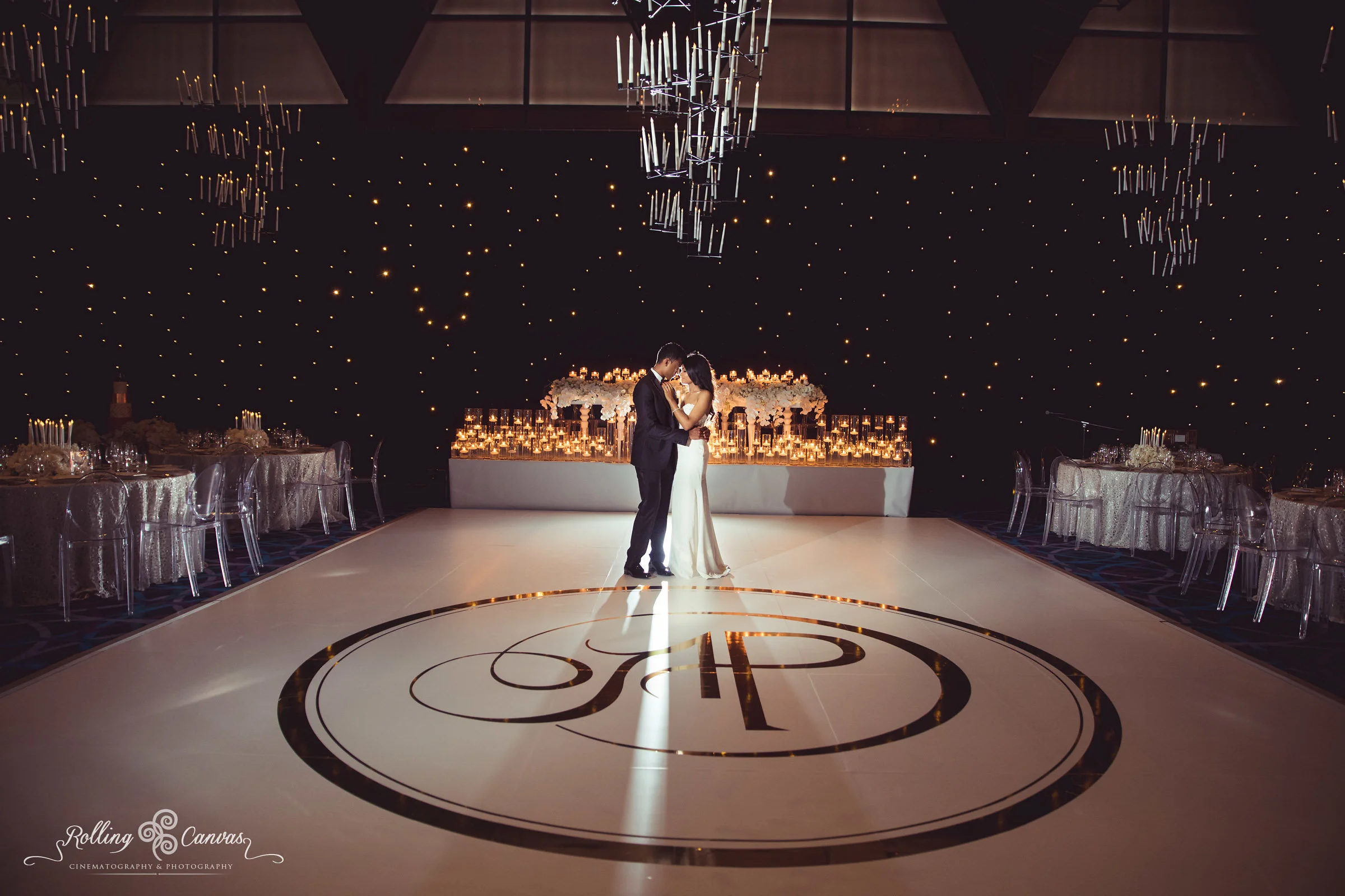 Wedding_Photography_Sydney_Rolling_Canvas_Presentation_black_white_elegant_reception_chandeliers_fairylights_white_dancefloor_luxury_linen_decor_Hyatt_Regency_Sydney-57242.jpg