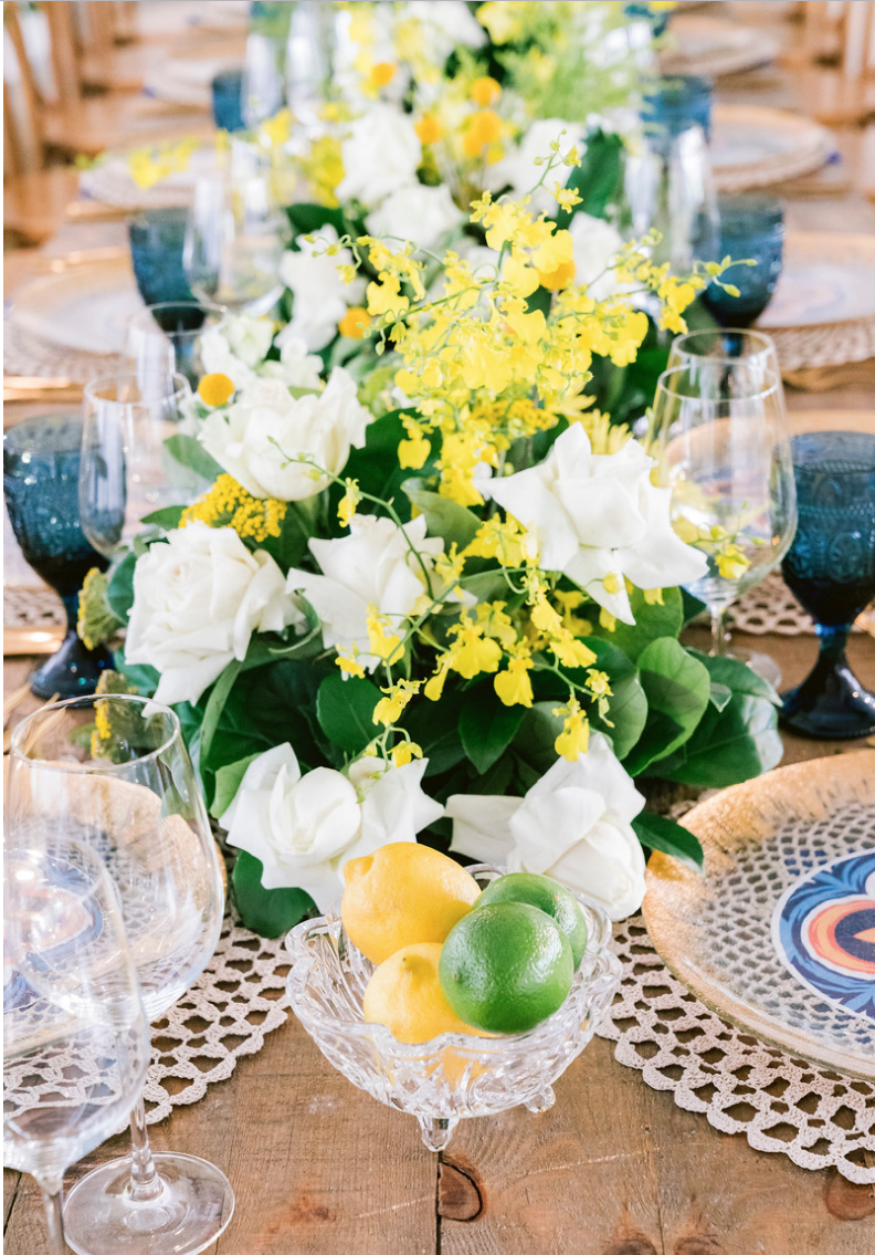 Special_event_activation_event_decor_event activation_positano_theme_blue_glasswear_lemon_lime_white_flowers.png