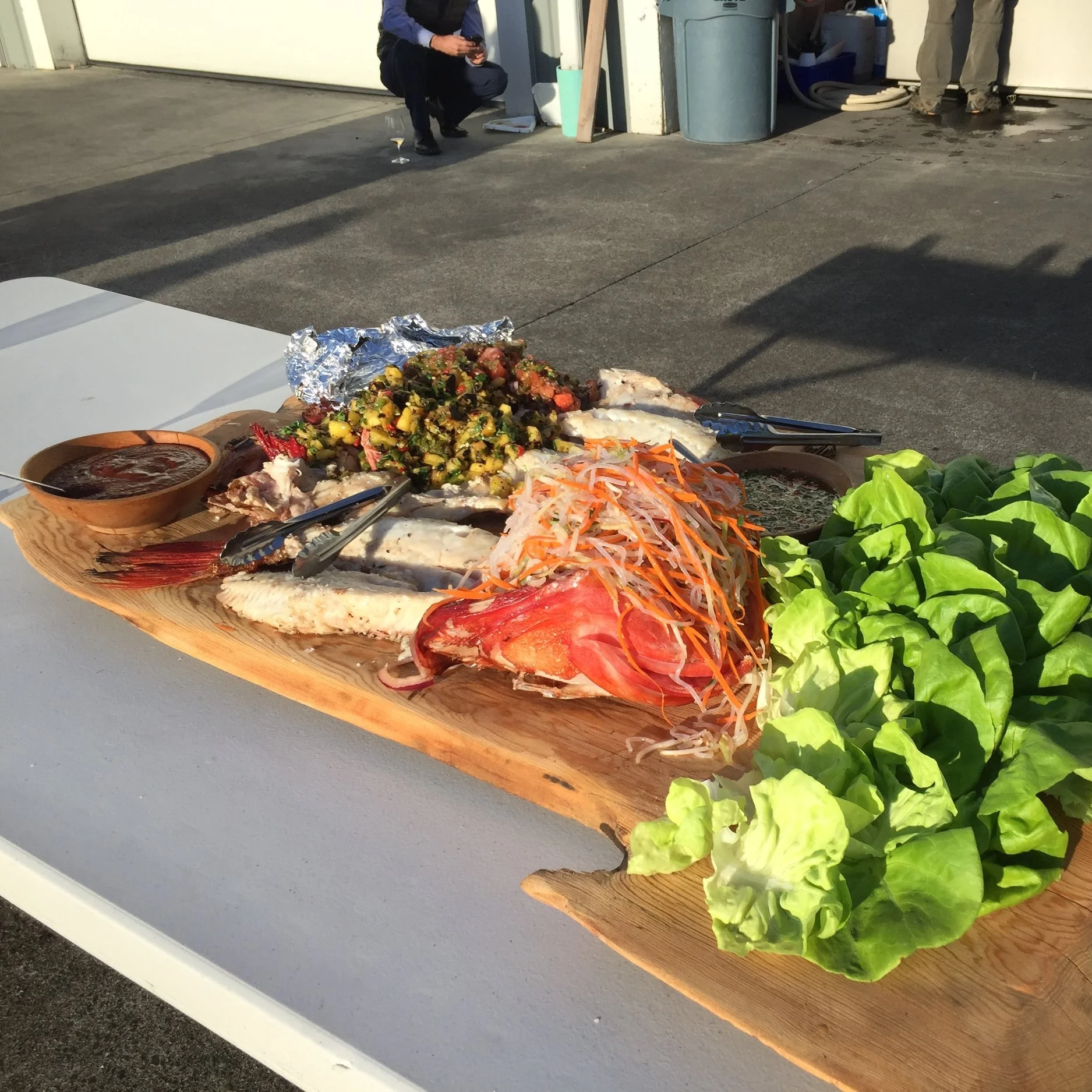  Grilled rock fish Thai lettuce wraps with a side of fresh salsa and chips.  