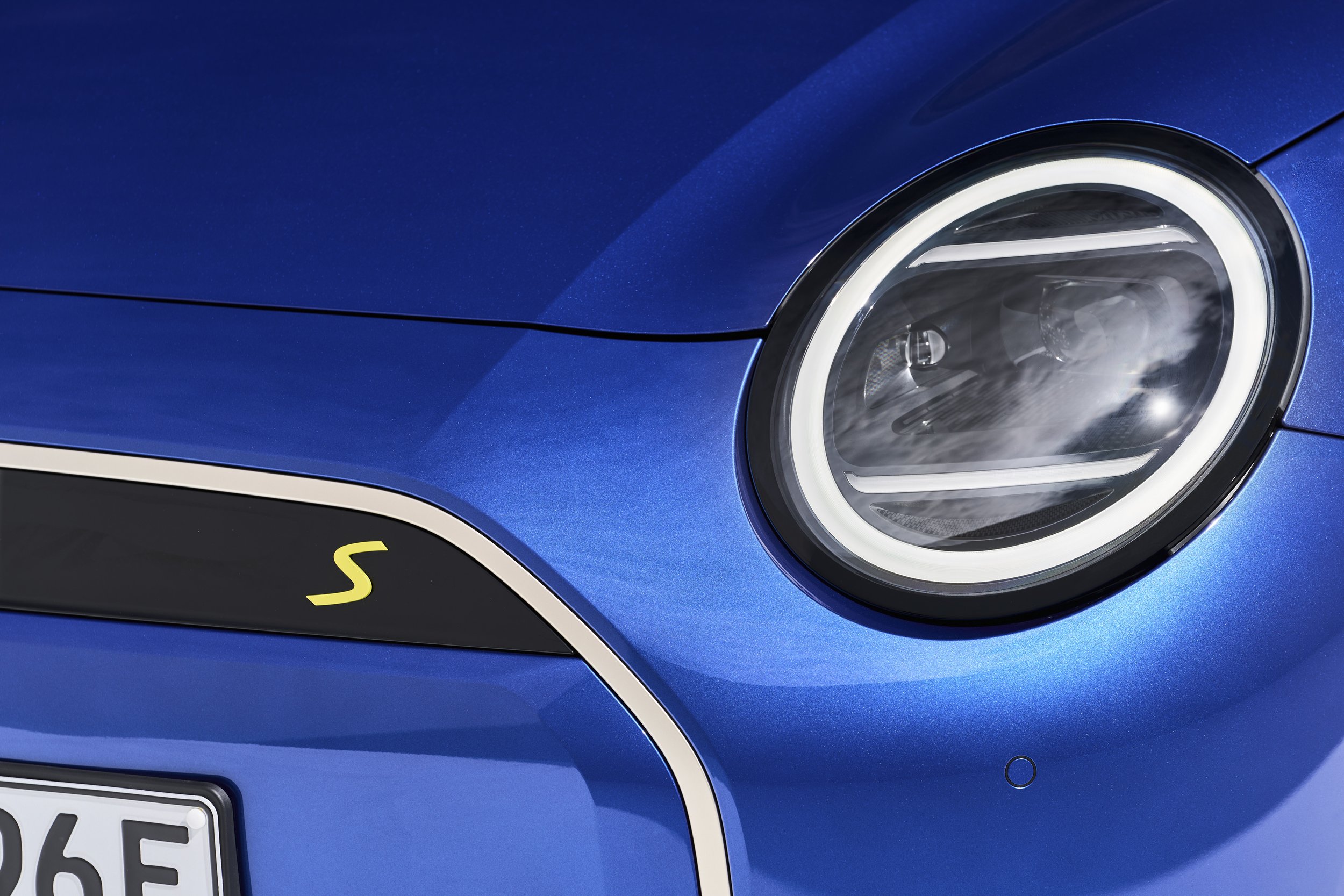 Petrol, electric Minis - two as one