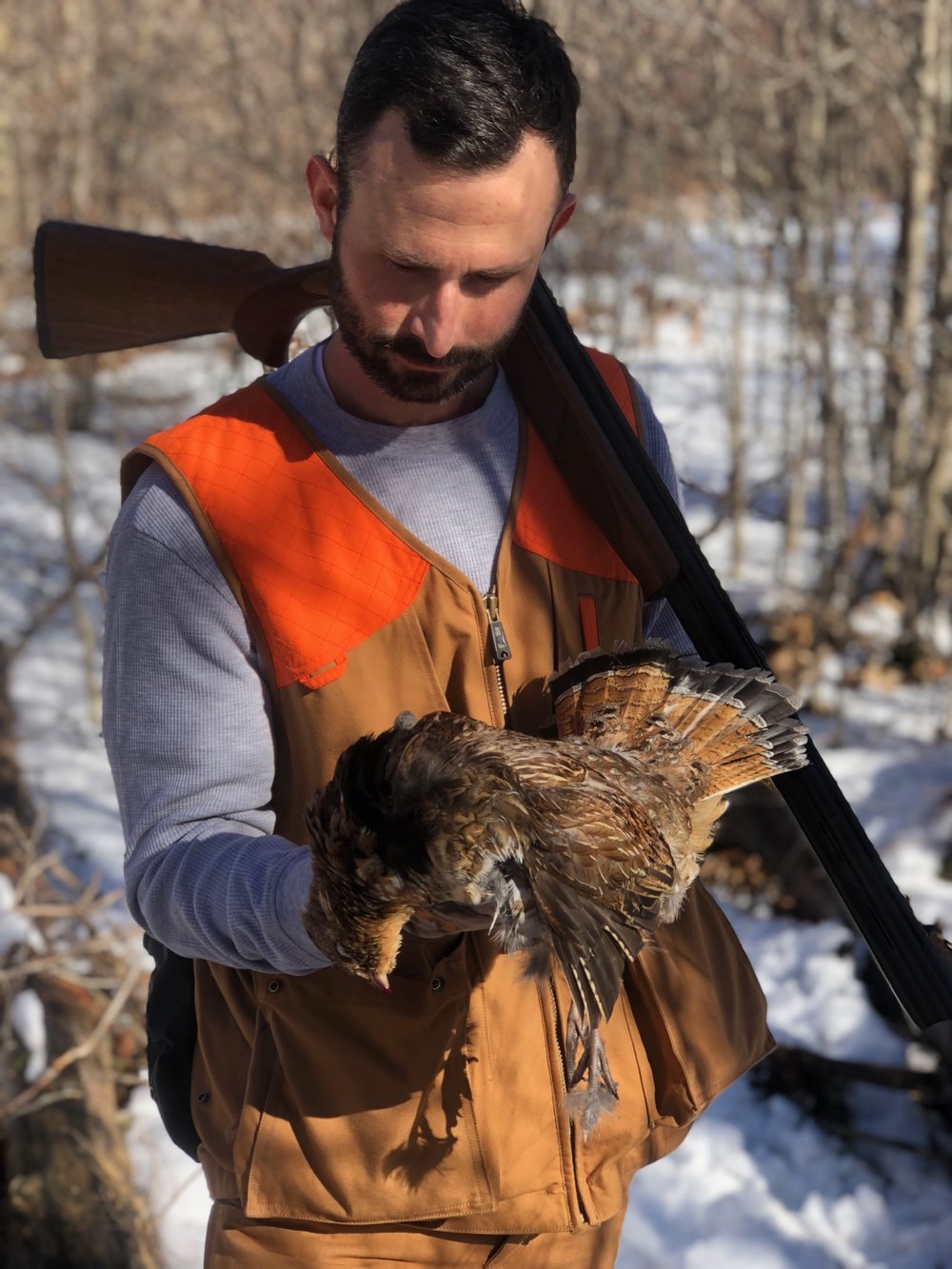  Justin with first Ruffed Grouse harvested over a pointing dog (photo credit: Cort Grubb) 