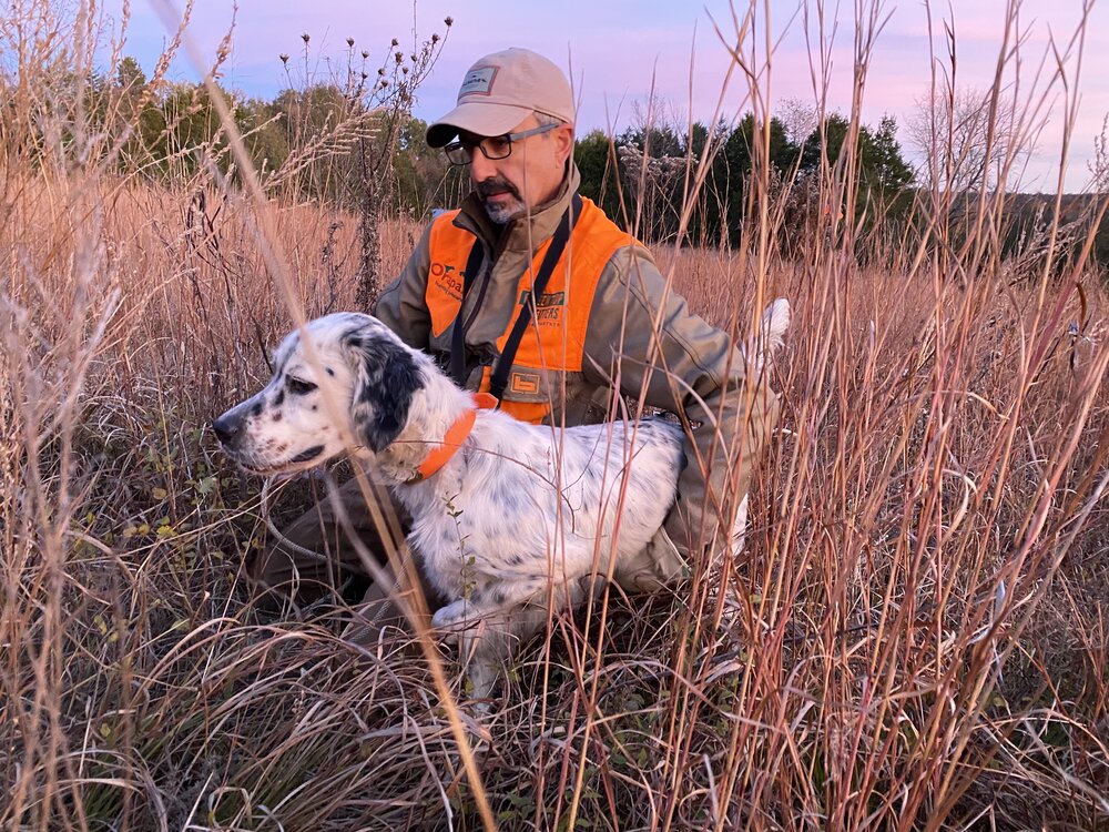  Neal Kauder practicing Huntsmith methods to steady Doc, a young Llewellin pup, on quail scent during his introduction to holding point 