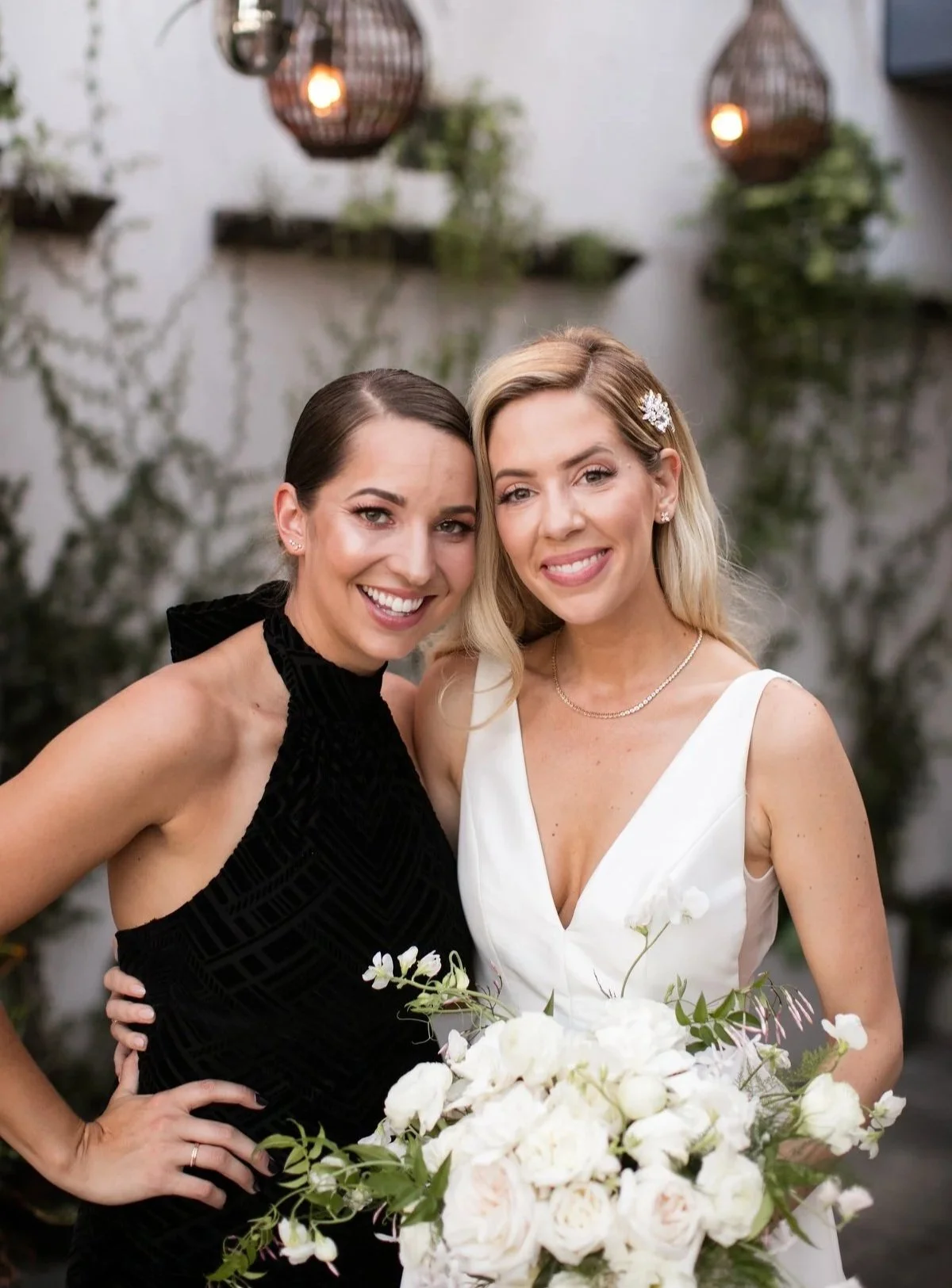 Natural bridal spray tan on bride and bridesmaid before wedding, customized by L.A. Sun Spray Tan