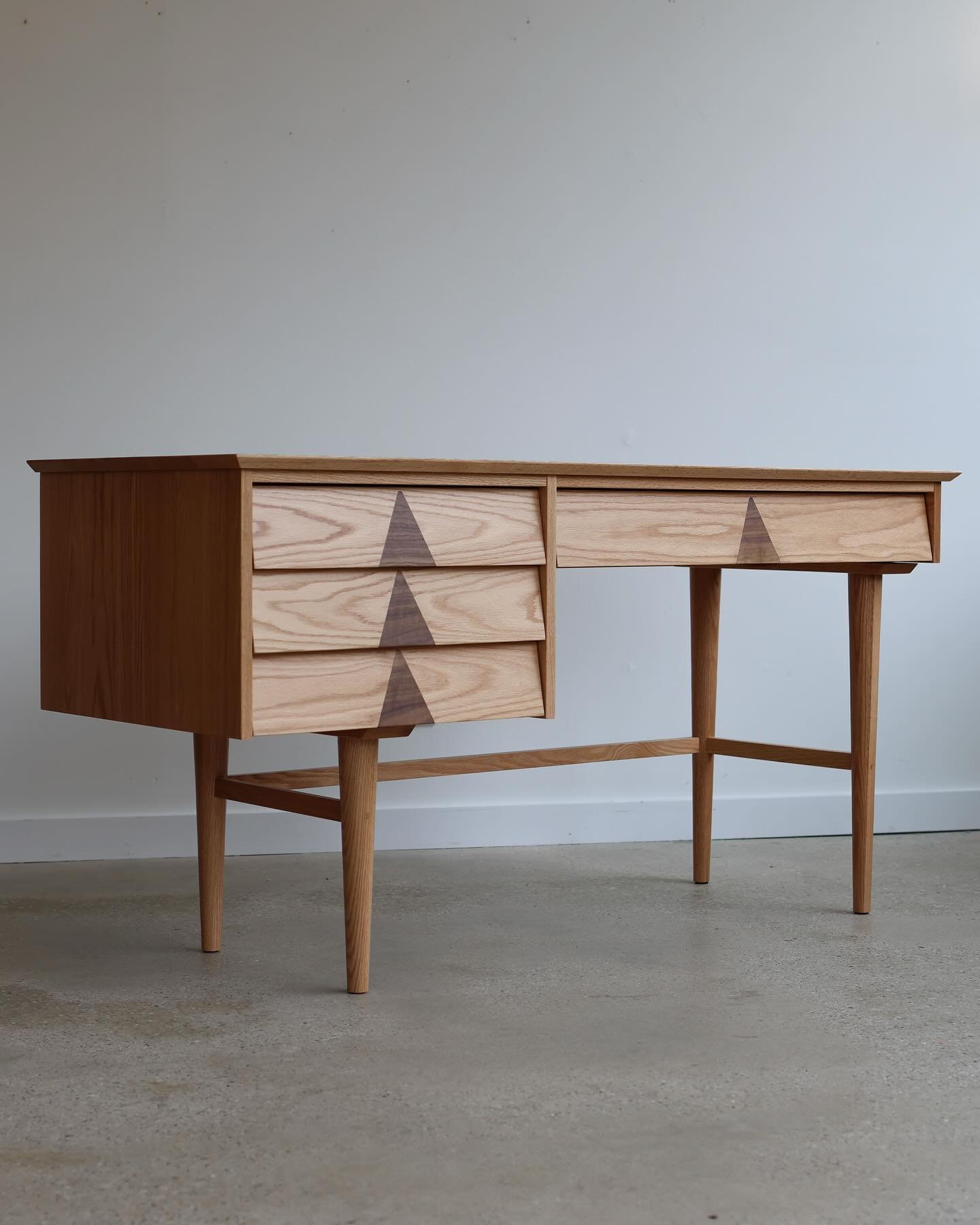 We love when customers take a chance on customizing our designs; the MONTY desk had never been built in oak! Stephanie went with the wider 60&rdquo; version with walnut inlays. 👏👏

What would your wood choices be? Available in walnut, cherry, oak o