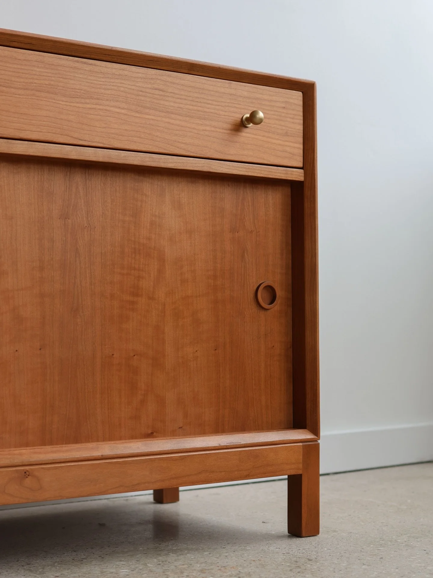 BEAR seen here in Cherry and Walnut. Solid brass handles or opt for a carved front. Real hardwood. Quality Builds. Made in the USA.