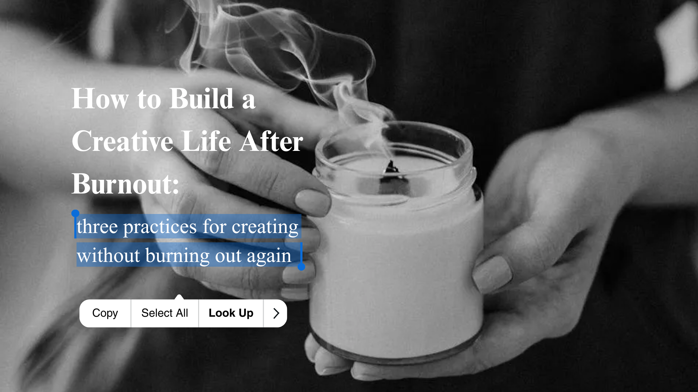 Hands holding a smoking candle jar — creative burnout recovery