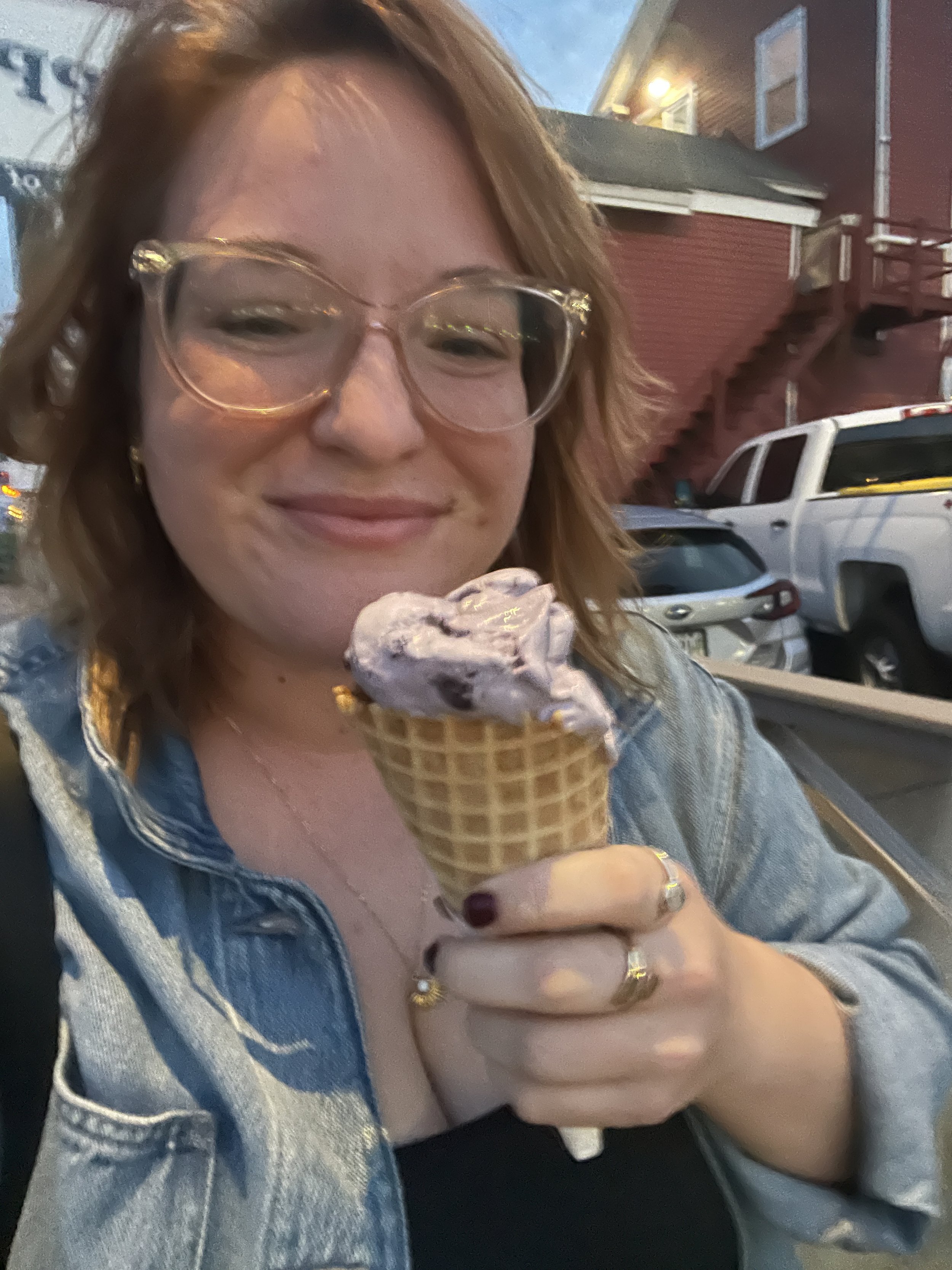 Renee Michaela with Blueberry Ice Cream in Boothbay Harbor Maine for slow living and traveling.JPG
