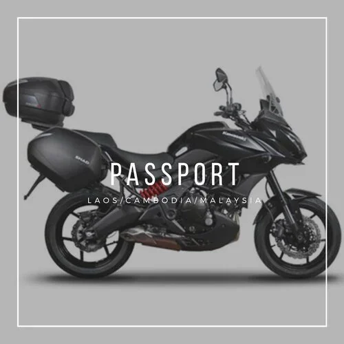 Black Kawasaki Versys 650, side view, with PASSPORT written over top of the image