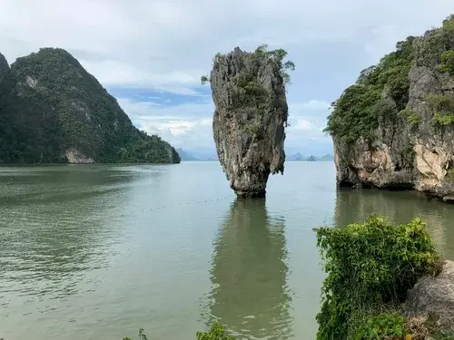James Bond Island, a tall and narrow limestone island in the middle of a Phang Nga bay in Thailand
