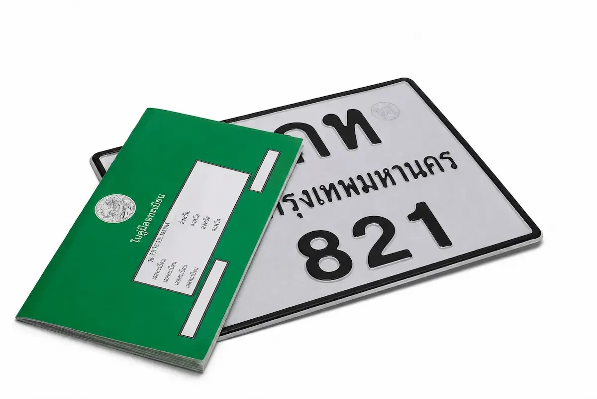 A Thailand motorbike registration book and license plate