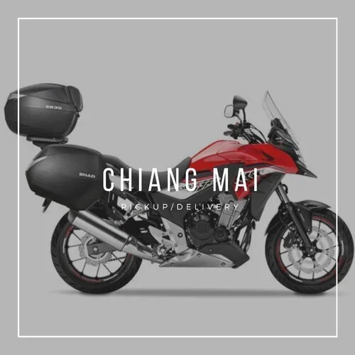 Red CB 500X, side view, with Chiang Mai written over the image
