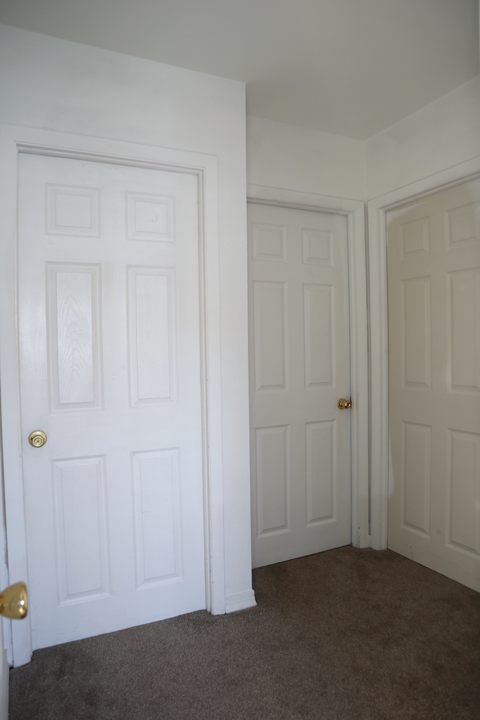 Nathan’s room and the two guestrooms. You can kind of tell that the hallway was sprayed with white paint pretty quickly when we first moved in. For some reason, the upstairs hallway walls are the only walls in the house that are super textured. The stairs and hallway are also the only areas (except the playroom) that have wall to wall carpeting.