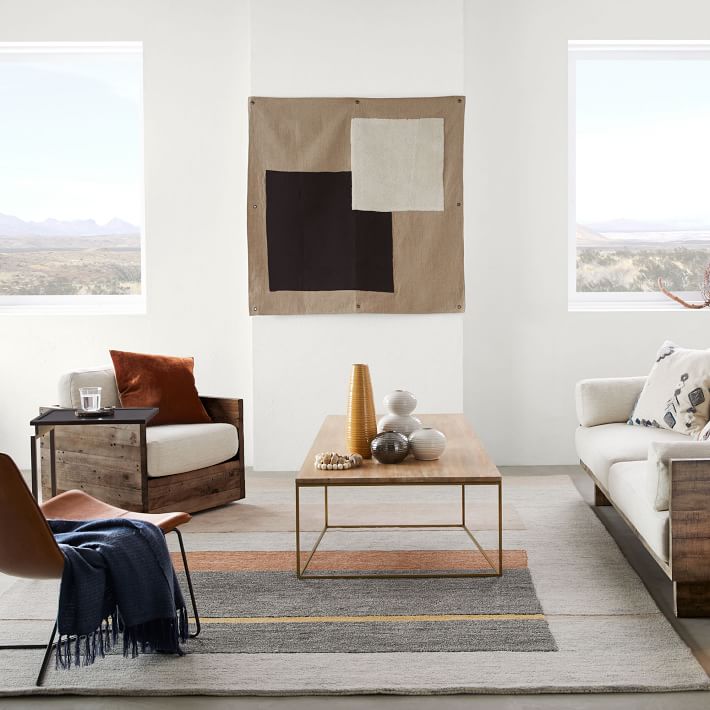I LOVE HOW MODERN AND MINIMAL THIS WALL TAPESTRY IS! SOMETHING LIKE THIS WOULD ALSO BE A SUPER EASY DIY.